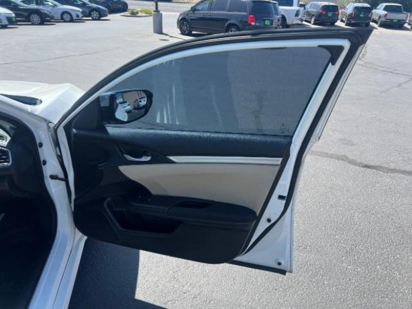 2016 Taffeta White /Ivory Honda Civic LX (2HGFC2F52GH) with an 2L I-4 DOHC engine, Automatic transmission, located at 1865 East Red Hills Pkwy, St. George, 84770, (435) 628-0023, 37.120850, -113.543640 - We specialize in helping ALL people get the best financing available. No matter your credit score, good, bad or none we can get you an amazing rate. Had a bankruptcy, divorce, or repossessions? We give you the green light to get your credit back on the road. Low down and affordable payments that fit- Photo#25