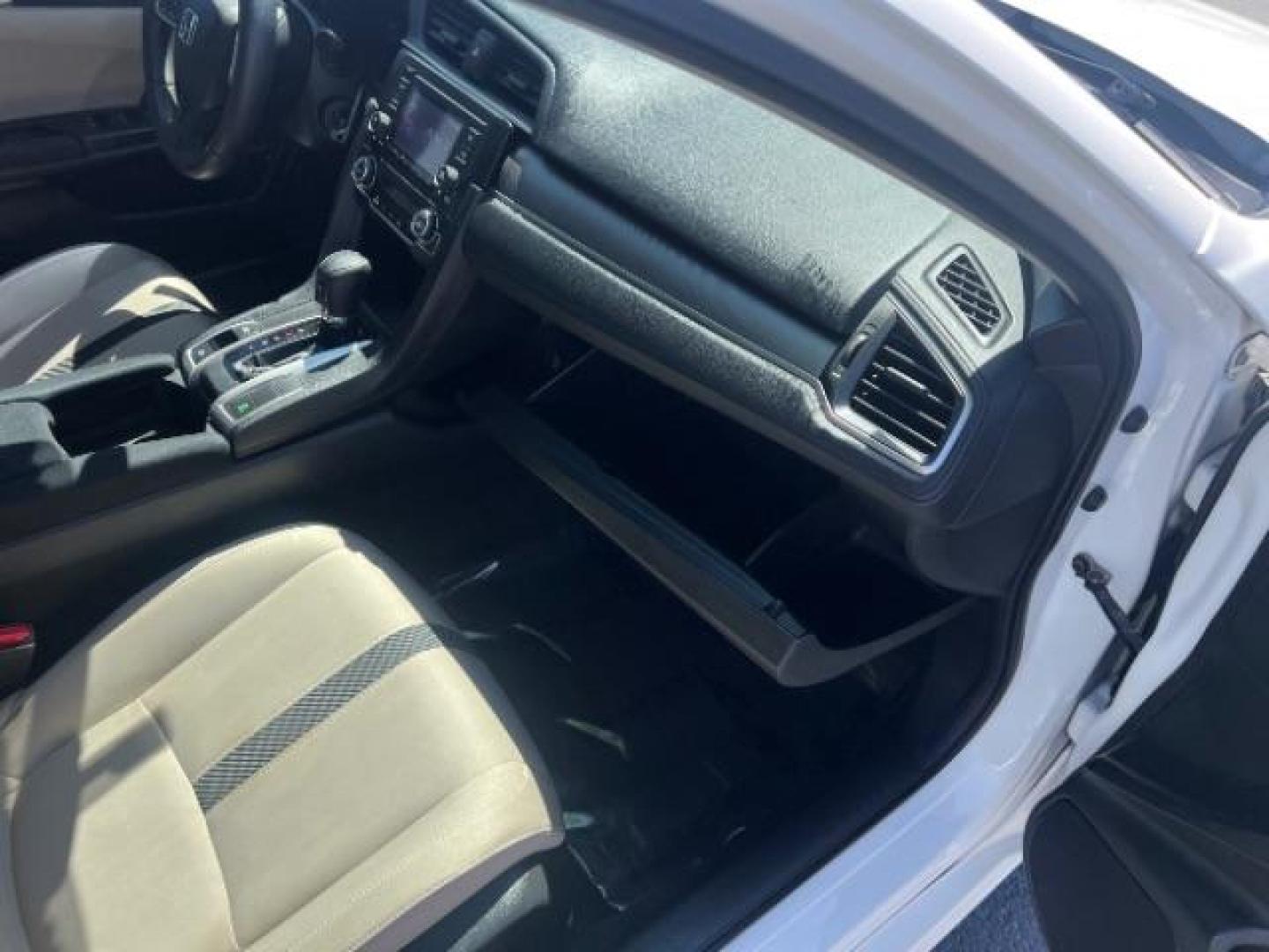 2016 Taffeta White /Ivory Honda Civic LX (2HGFC2F52GH) with an 2L I-4 DOHC engine, Automatic transmission, located at 1865 East Red Hills Pkwy, St. George, 84770, (435) 628-0023, 37.120850, -113.543640 - We specialize in helping ALL people get the best financing available. No matter your credit score, good, bad or none we can get you an amazing rate. Had a bankruptcy, divorce, or repossessions? We give you the green light to get your credit back on the road. Low down and affordable payments that fit- Photo#27