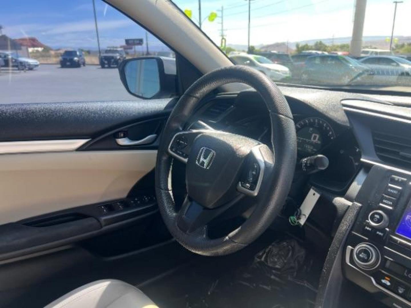 2016 Taffeta White /Ivory Honda Civic LX (2HGFC2F52GH) with an 2L I-4 DOHC engine, Automatic transmission, located at 1865 East Red Hills Pkwy, St. George, 84770, (435) 628-0023, 37.120850, -113.543640 - We specialize in helping ALL people get the best financing available. No matter your credit score, good, bad or none we can get you an amazing rate. Had a bankruptcy, divorce, or repossessions? We give you the green light to get your credit back on the road. Low down and affordable payments that fit- Photo#28