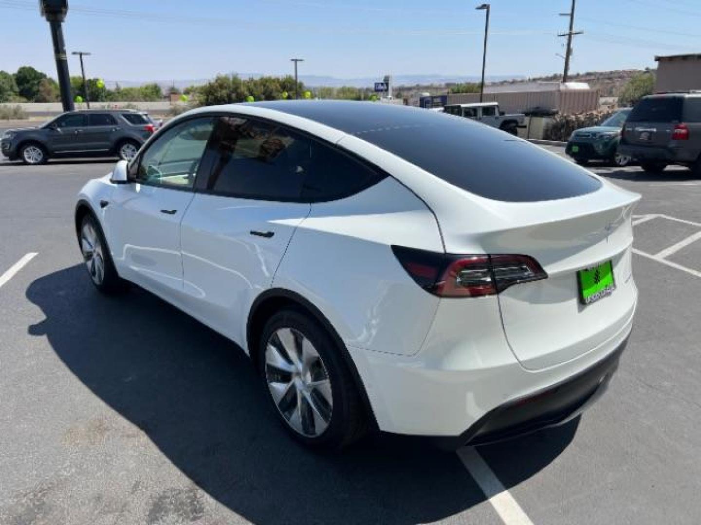 2021 Pearl White Multi-Coat Tesla Model Y Long Range Dual Motor All-Wheel Drive (5YJYGAEE9MF) , located at 1865 East Red Hills Pkwy, St. George, 84770, (435) 628-0023, 37.120850, -113.543640 - This Tesla is an AWD Long Range. 3rd ROW! 7 Seats!. Battery is 95% healthy, 293 on full charge. Near new condition! Full Tesla factory warranty up to 120k miles. Extended EV battery warranty available. Financing for ALL credit types. 4 Seasons Auto THE southern Utah Tesla Experts. Call or text - Photo#2