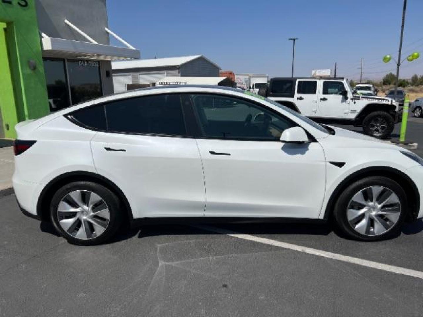 2021 Pearl White Multi-Coat Tesla Model Y Long Range Dual Motor All-Wheel Drive (5YJYGAEE9MF) , located at 1865 East Red Hills Pkwy, St. George, 84770, (435) 628-0023, 37.120850, -113.543640 - This Tesla is an AWD Long Range. 3rd ROW! 7 Seats!. Battery is 95% healthy, 293 on full charge. Near new condition! Full Tesla factory warranty up to 120k miles. Extended EV battery warranty available. Financing for ALL credit types. 4 Seasons Auto THE southern Utah Tesla Experts. Call or text - Photo#5