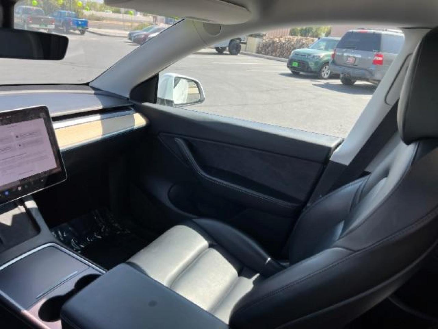 2021 Pearl White Multi-Coat Tesla Model Y Long Range Dual Motor All-Wheel Drive (5YJYGAEE9MF) , located at 1865 East Red Hills Pkwy, St. George, 84770, (435) 628-0023, 37.120850, -113.543640 - This Tesla is an AWD Long Range. 3rd ROW! 7 Seats!. Battery is 95% healthy, 293 on full charge. Near new condition! Full Tesla factory warranty up to 120k miles. Extended EV battery warranty available. Financing for ALL credit types. 4 Seasons Auto THE southern Utah Tesla Experts. Call or text - Photo#16