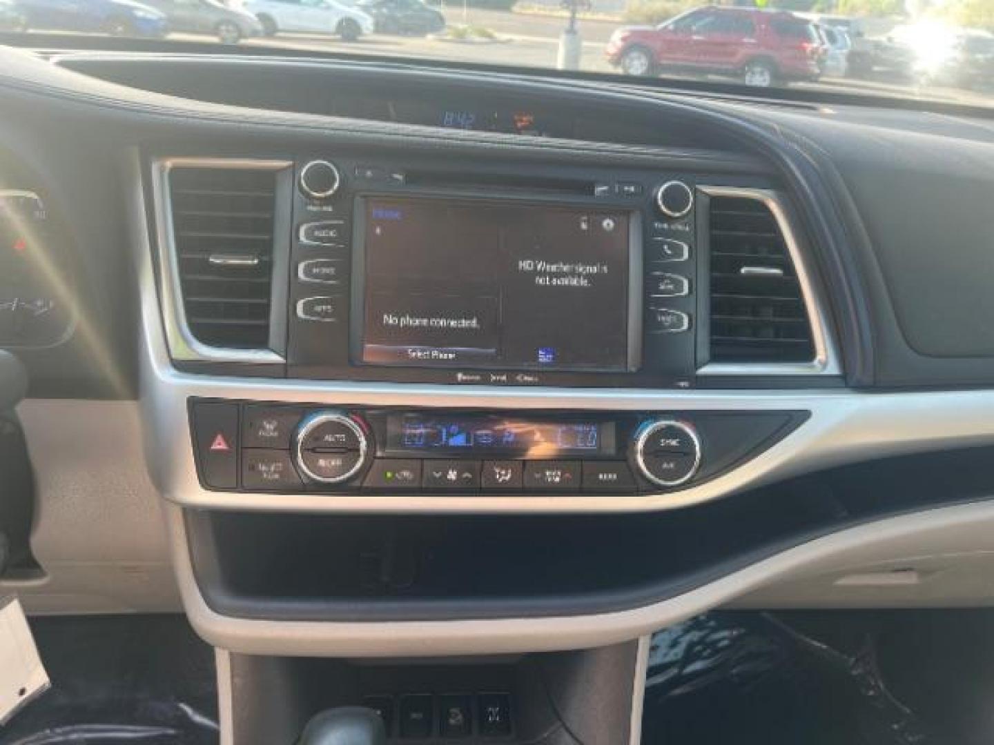 2019 Celestial Silver Metallic /Ash Toyota Highlander LE Plus (5TDBZRFH8KS) with an 3.5L V-6 port/direct injection engine, AUTOMATIC transmission, located at 1865 East Red Hills Pkwy, St. George, 84770, (435) 628-0023, 37.120850, -113.543640 - We specialize in helping ALL people get the best financing available. No matter your credit score, good, bad or none we can get you an amazing rate. Had a bankruptcy, divorce, or repossessions? We give you the green light to get your credit back on the road. Low down and affordable payments that fit - Photo#18