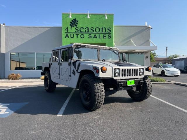 1994 Silver /LEATHER AM GENERAL HUMMER 4DR (156266) with an 6.2L NA engine, AUTOMATIC transmission, located at 1865 East Red Hills Pkwy, St. George, 84770, (435) 628-0023, 37.120850, -113.543640 - Thouroghly upgraded M998. 6.2 V8. Full frame and body rhinolined, Restomod A/C, Full roof, Full doors (set of half doors also included). Upgraded seats, 4 noise cancelling headphones and more. Runs and drives perfect. Starts on first crank everytime. NO LEAKS. A/C unit is brand new and works amazin - Photo#0
