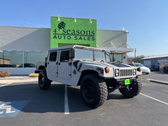 1994 Silver /LEATHER AM GENERAL HUMMER 4DR (156266) with an 6.2L NA engine, AUTOMATIC transmission, located at 1865 East Red Hills Pkwy, St. George, 84770, (435) 628-0023, 37.120850, -113.543640 - Thouroghly upgraded M998. 6.2 V8. Full frame and body rhinolined, Restomod A/C, Full roof, Full doors (set of half doors also included). Upgraded seats, 4 noise cancelling headphones and more. Runs and drives perfect. Starts on first crank everytime. NO LEAKS. A/C unit is brand new and works amazin - Photo#1