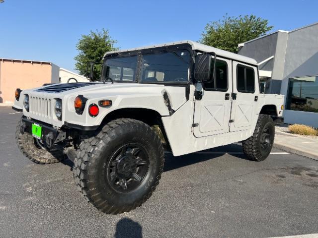 1994 Silver /LEATHER AM GENERAL HUMMER 4DR (156266) with an 6.2L NA engine, AUTOMATIC transmission, located at 1865 East Red Hills Pkwy, St. George, 84770, (435) 628-0023, 37.120850, -113.543640 - Thouroghly upgraded M998. 6.2 V8. Full frame and body rhinolined, Restomod A/C, Full roof, Full doors (set of half doors also included). Upgraded seats, 4 noise cancelling headphones and more. Runs and drives perfect. Starts on first crank everytime. NO LEAKS. A/C unit is brand new and works amazin - Photo#3