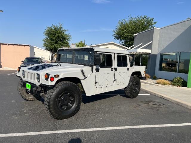 1994 Silver /LEATHER AM GENERAL HUMMER 4DR (156266) with an 6.2L NA engine, AUTOMATIC transmission, located at 1865 East Red Hills Pkwy, St. George, 84770, (435) 628-0023, 37.120850, -113.543640 - Thouroghly upgraded M998. 6.2 V8. Full frame and body rhinolined, Restomod A/C, Full roof, Full doors (set of half doors also included). Upgraded seats, 4 noise cancelling headphones and more. Runs and drives perfect. Starts on first crank everytime. NO LEAKS. A/C unit is brand new and works amazin - Photo#4