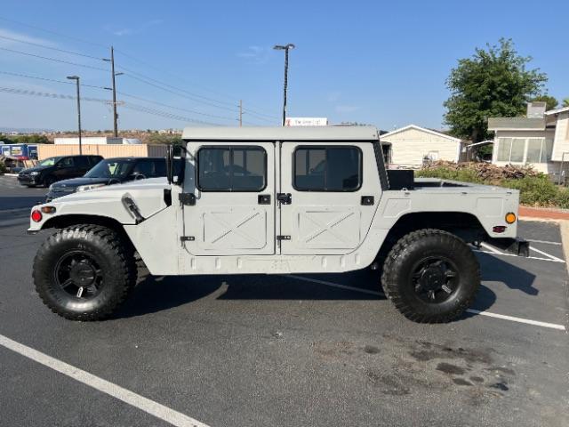 1994 Silver /LEATHER AM GENERAL HUMMER 4DR (156266) with an 6.2L NA engine, AUTOMATIC transmission, located at 1865 East Red Hills Pkwy, St. George, 84770, (435) 628-0023, 37.120850, -113.543640 - Thouroghly upgraded M998. 6.2 V8. Full frame and body rhinolined, Restomod A/C, Full roof, Full doors (set of half doors also included). Upgraded seats, 4 noise cancelling headphones and more. Runs and drives perfect. Starts on first crank everytime. NO LEAKS. A/C unit is brand new and works amazin - Photo#8