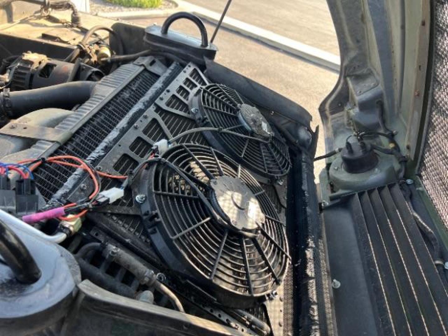 1994 Silver /LEATHER AM GENERAL HUMMER 4DR (156266) with an 6.2L NA engine, AUTOMATIC transmission, located at 1865 East Red Hills Pkwy, St. George, 84770, (435) 628-0023, 37.120850, -113.543640 - Thouroghly upgraded M998. 6.2 V8. Full frame and body rhinolined, Restomod A/C, Full roof, Full doors (set of half doors also included). Upgraded seats, 4 noise cancelling headphones and more. Runs and drives perfect. Starts on first crank everytime. NO LEAKS. A/C unit is brand new and works amazin - Photo#33