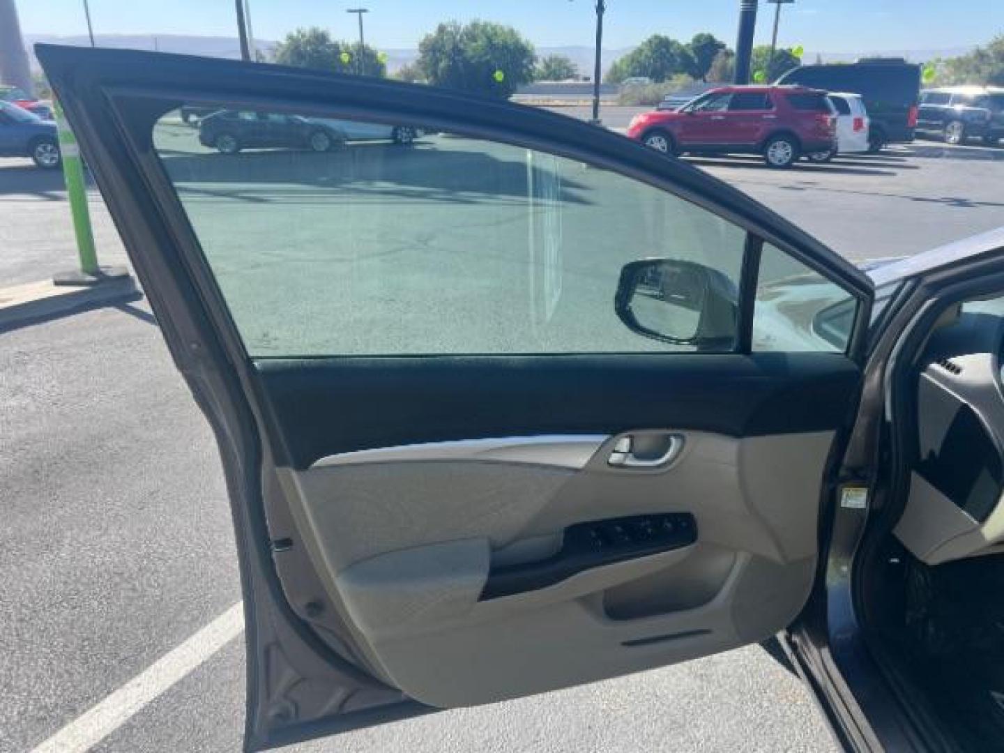 2013 Kona Coffee Metallic /Beige Honda Civic EX (19XFB2F82DE) with an 1.8L I-4 i-VTEC variable valve control engine, Automatic transmission, located at 940 North Main Street, Cedar City, UT, 84720, (435) 628-0023, 37.692936, -113.061897 - We specialize in helping ALL people get the best financing available. No matter your credit score, good, bad or none we can get you an amazing rate. Had a bankruptcy, divorce, or repossessions? We give you the green light to get your credit back on the road. Low down and affordable payments that fit - Photo#12