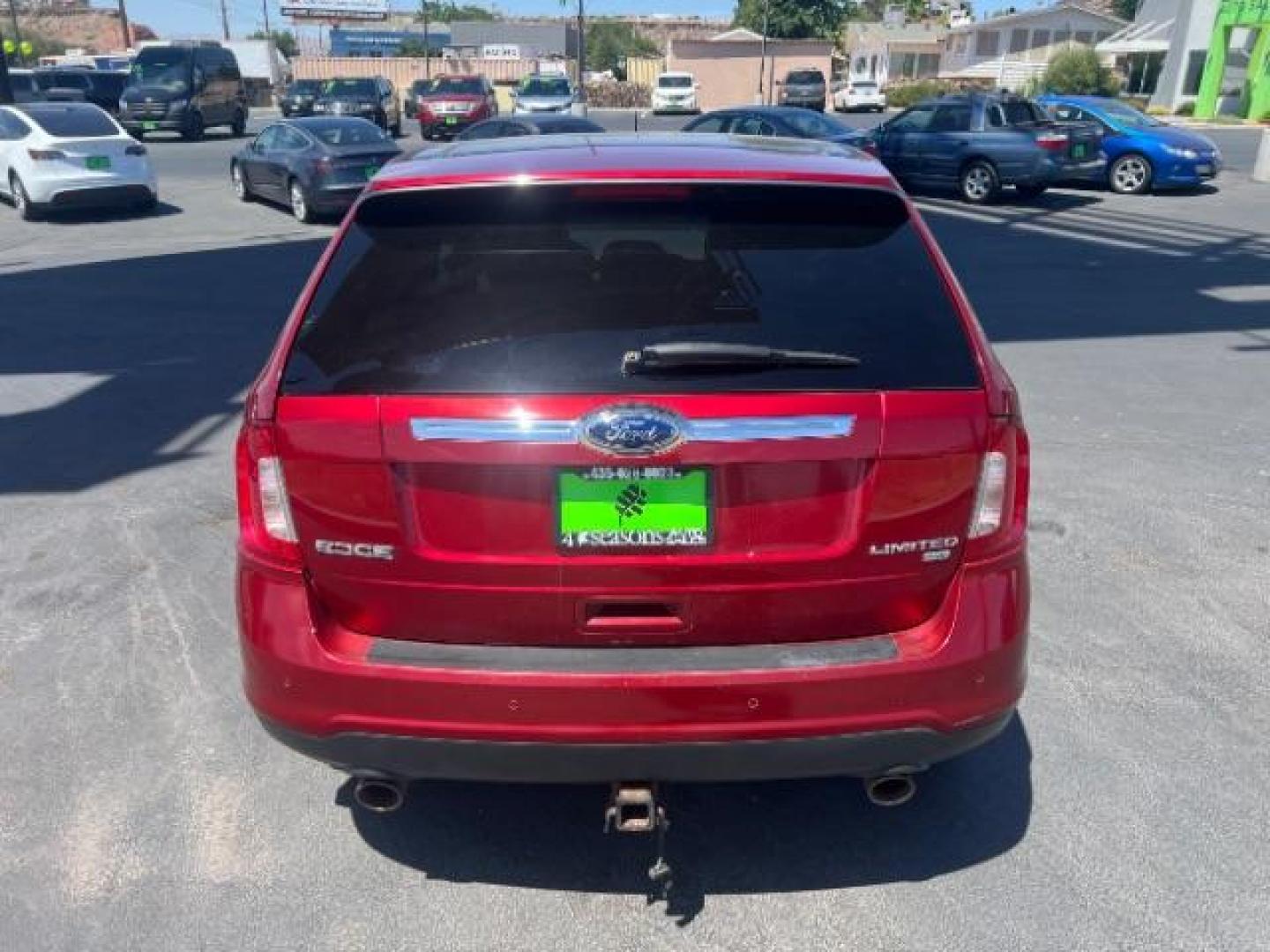2013 Ruby Red Metallic Tinted Clearcoat /Sienna w/Charcoal Black Ford Edge Limited (2FMDK4KC4DB) with an 3.5L V-6 DOHC engine, AUTOMATIC transmission, located at 1865 East Red Hills Pkwy, St. George, 84770, (435) 628-0023, 37.120850, -113.543640 - Photo#5