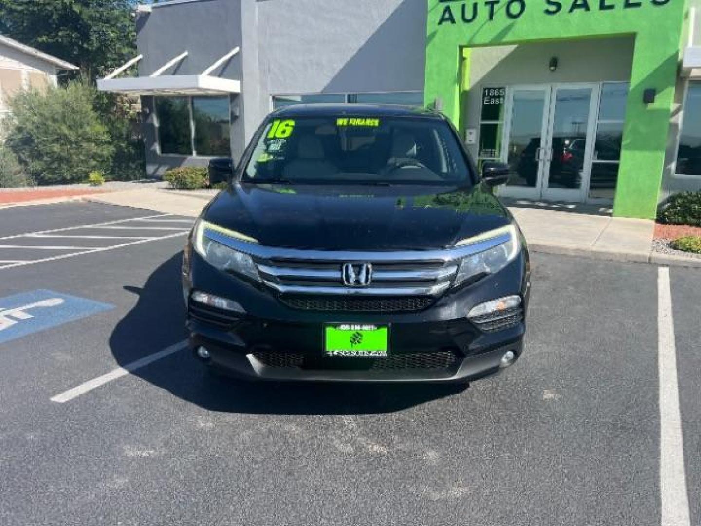 2016 Crystal Black Pearl /Gray Honda Pilot EX-L (5FNYF5H59GB) with an 3.5L V-6 gasoline direct injection engine, Automatic transmission, located at 1865 East Red Hills Pkwy, St. George, 84770, (435) 628-0023, 37.120850, -113.543640 - Photo#1