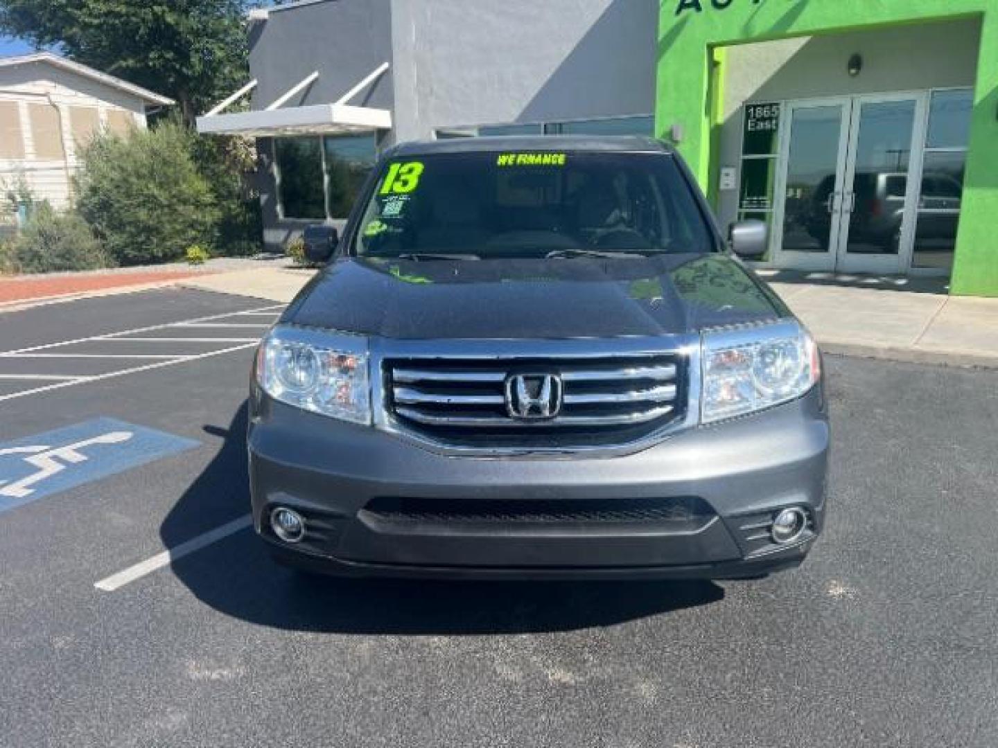 2013 Polished Metal Metallic /Gray Honda Pilot EX (5FNYF3H47DB) with an 3.5L V-6 i-VTEC VCM variable valve control engine, Automatic transmission, located at 1865 East Red Hills Pkwy, St. George, 84770, (435) 628-0023, 37.120850, -113.543640 - Photo#1