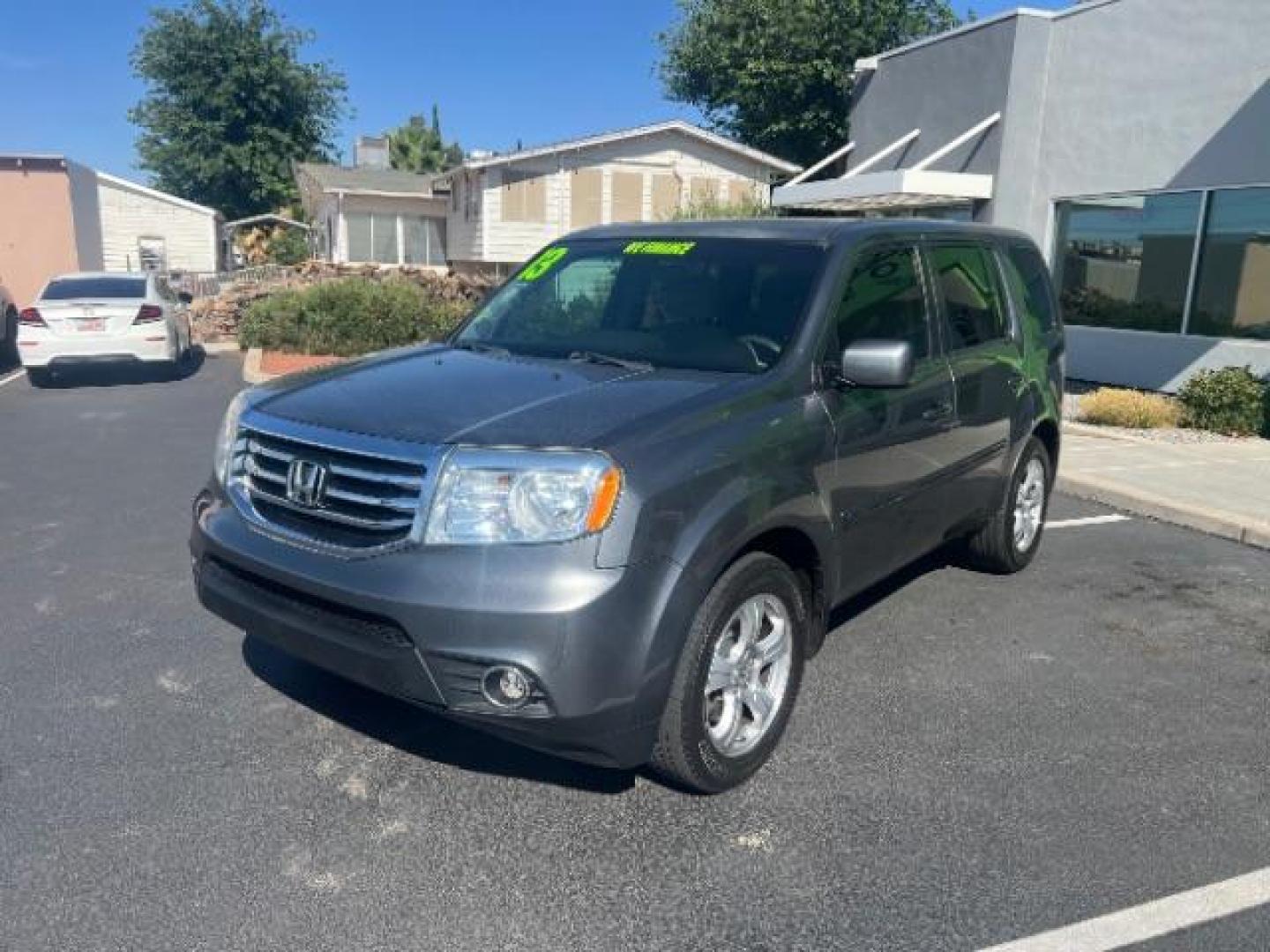 2013 Polished Metal Metallic /Gray Honda Pilot EX (5FNYF3H47DB) with an 3.5L V-6 i-VTEC VCM variable valve control engine, Automatic transmission, located at 1865 East Red Hills Pkwy, St. George, 84770, (435) 628-0023, 37.120850, -113.543640 - Photo#2