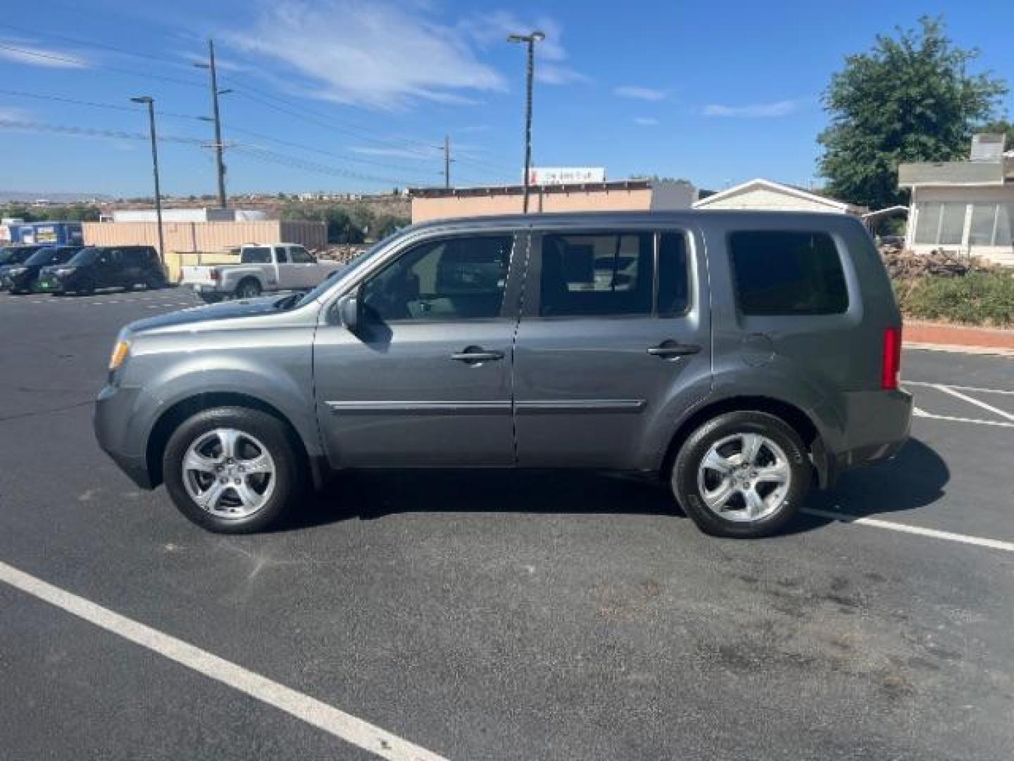 2013 Polished Metal Metallic /Gray Honda Pilot EX (5FNYF3H47DB) with an 3.5L V-6 i-VTEC VCM variable valve control engine, Automatic transmission, located at 1865 East Red Hills Pkwy, St. George, 84770, (435) 628-0023, 37.120850, -113.543640 - Photo#3