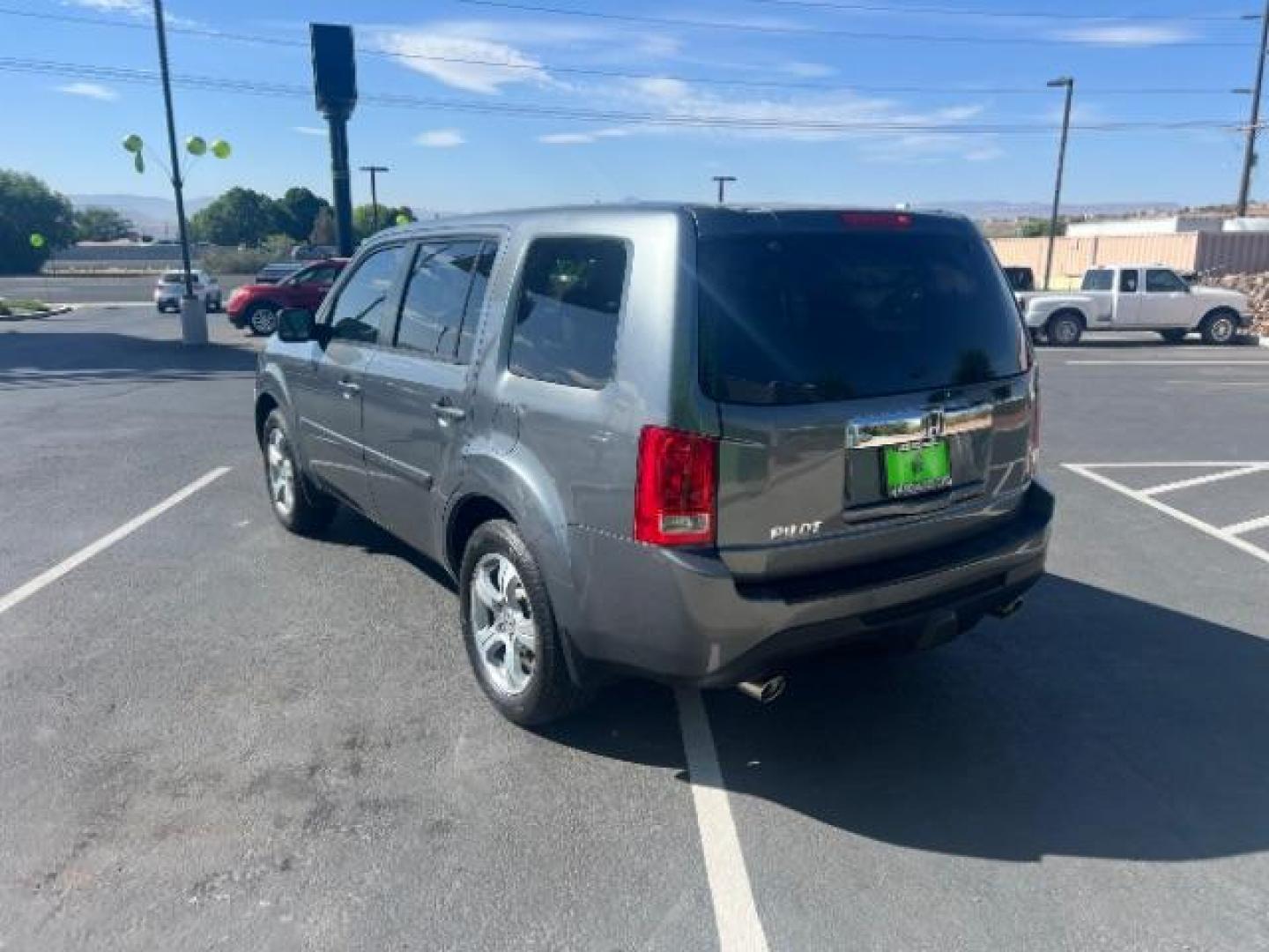 2013 Polished Metal Metallic /Gray Honda Pilot EX (5FNYF3H47DB) with an 3.5L V-6 i-VTEC VCM variable valve control engine, Automatic transmission, located at 1865 East Red Hills Pkwy, St. George, 84770, (435) 628-0023, 37.120850, -113.543640 - Photo#4