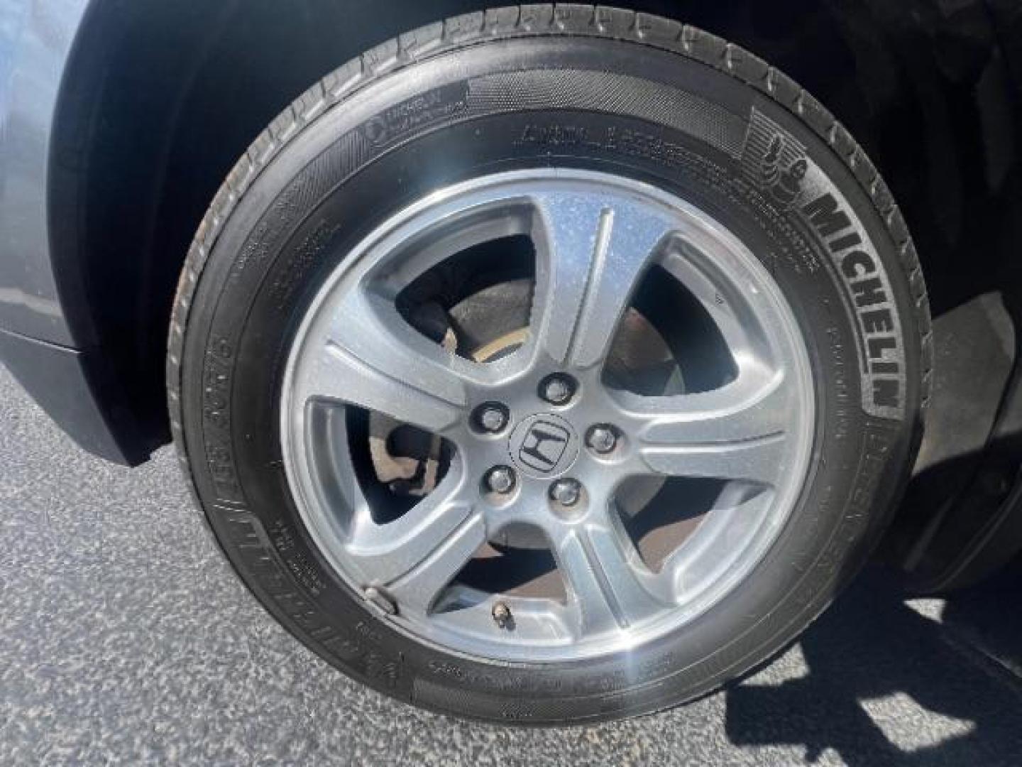2013 Polished Metal Metallic /Gray Honda Pilot EX (5FNYF3H47DB) with an 3.5L V-6 i-VTEC VCM variable valve control engine, Automatic transmission, located at 1865 East Red Hills Pkwy, St. George, 84770, (435) 628-0023, 37.120850, -113.543640 - Photo#10