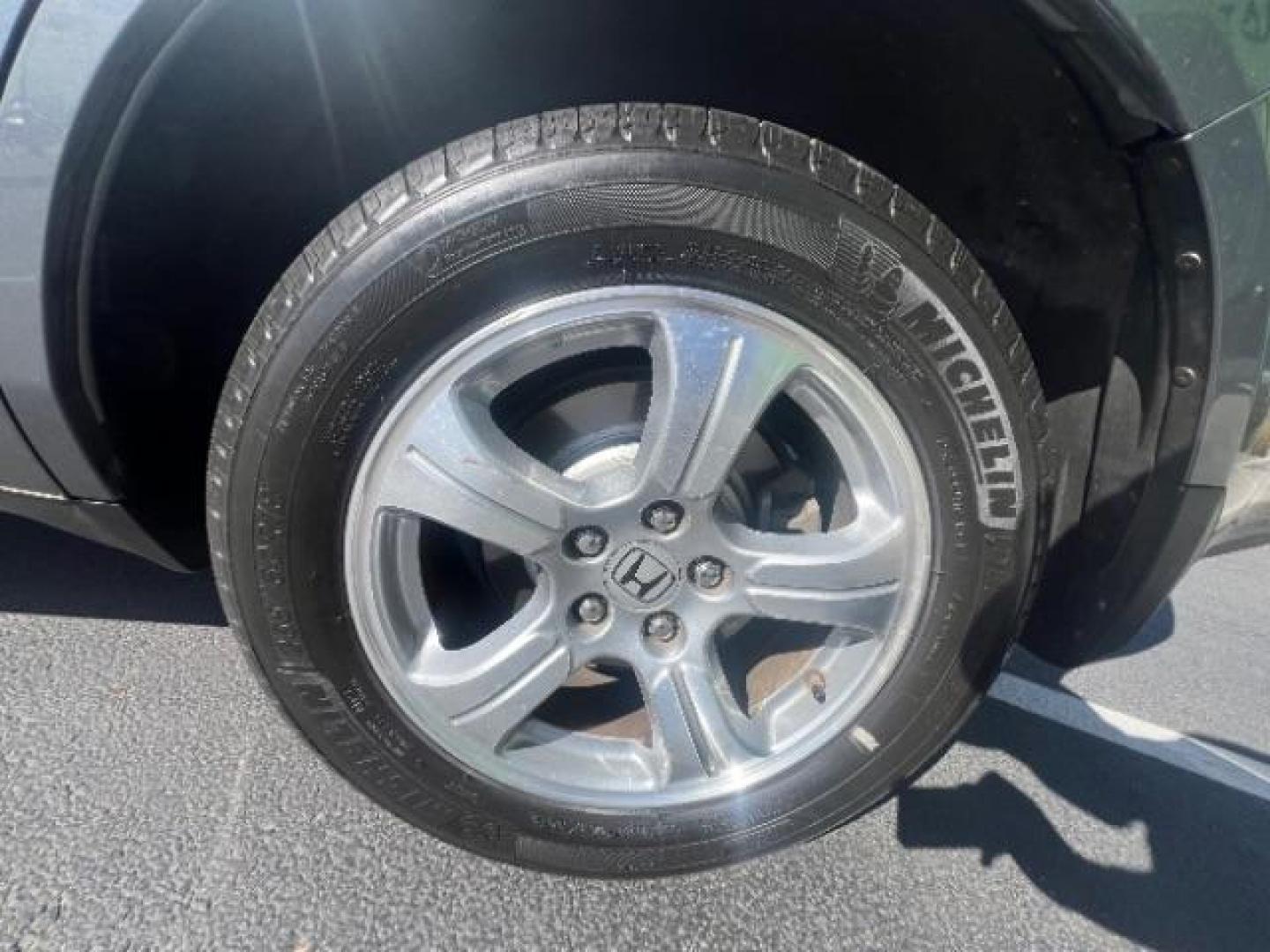 2013 Polished Metal Metallic /Gray Honda Pilot EX (5FNYF3H47DB) with an 3.5L V-6 i-VTEC VCM variable valve control engine, Automatic transmission, located at 1865 East Red Hills Pkwy, St. George, 84770, (435) 628-0023, 37.120850, -113.543640 - Photo#11