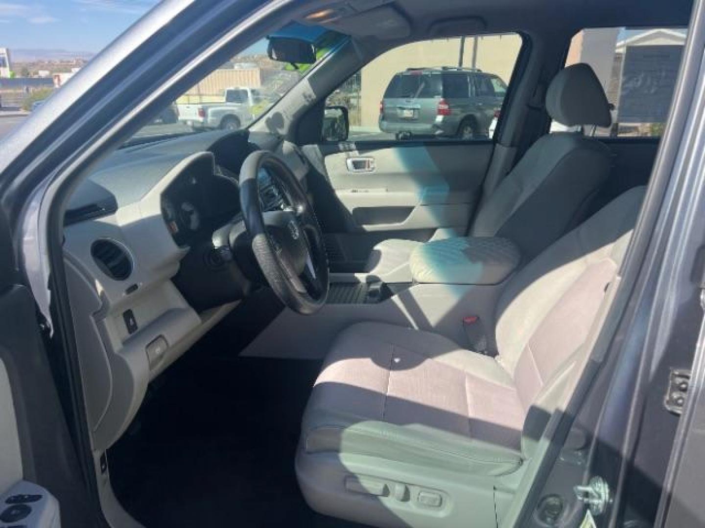 2013 Polished Metal Metallic /Gray Honda Pilot EX (5FNYF3H47DB) with an 3.5L V-6 i-VTEC VCM variable valve control engine, Automatic transmission, located at 1865 East Red Hills Pkwy, St. George, 84770, (435) 628-0023, 37.120850, -113.543640 - Photo#14