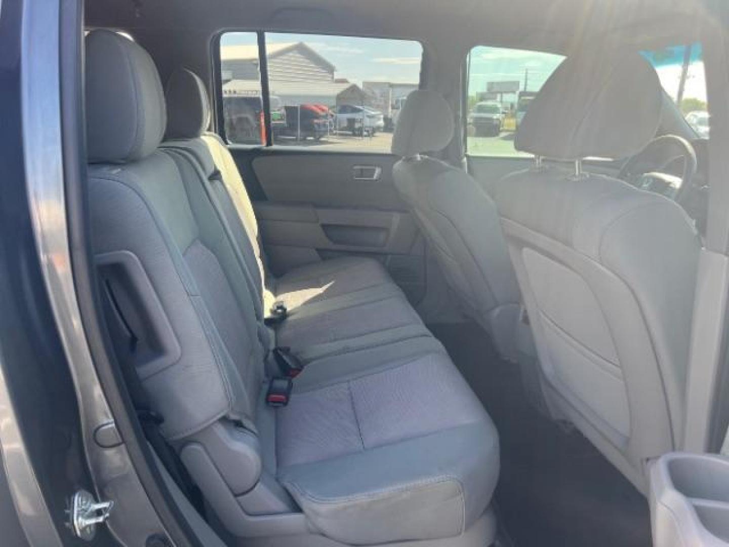 2013 Polished Metal Metallic /Gray Honda Pilot EX (5FNYF3H47DB) with an 3.5L V-6 i-VTEC VCM variable valve control engine, Automatic transmission, located at 1865 East Red Hills Pkwy, St. George, 84770, (435) 628-0023, 37.120850, -113.543640 - Photo#30