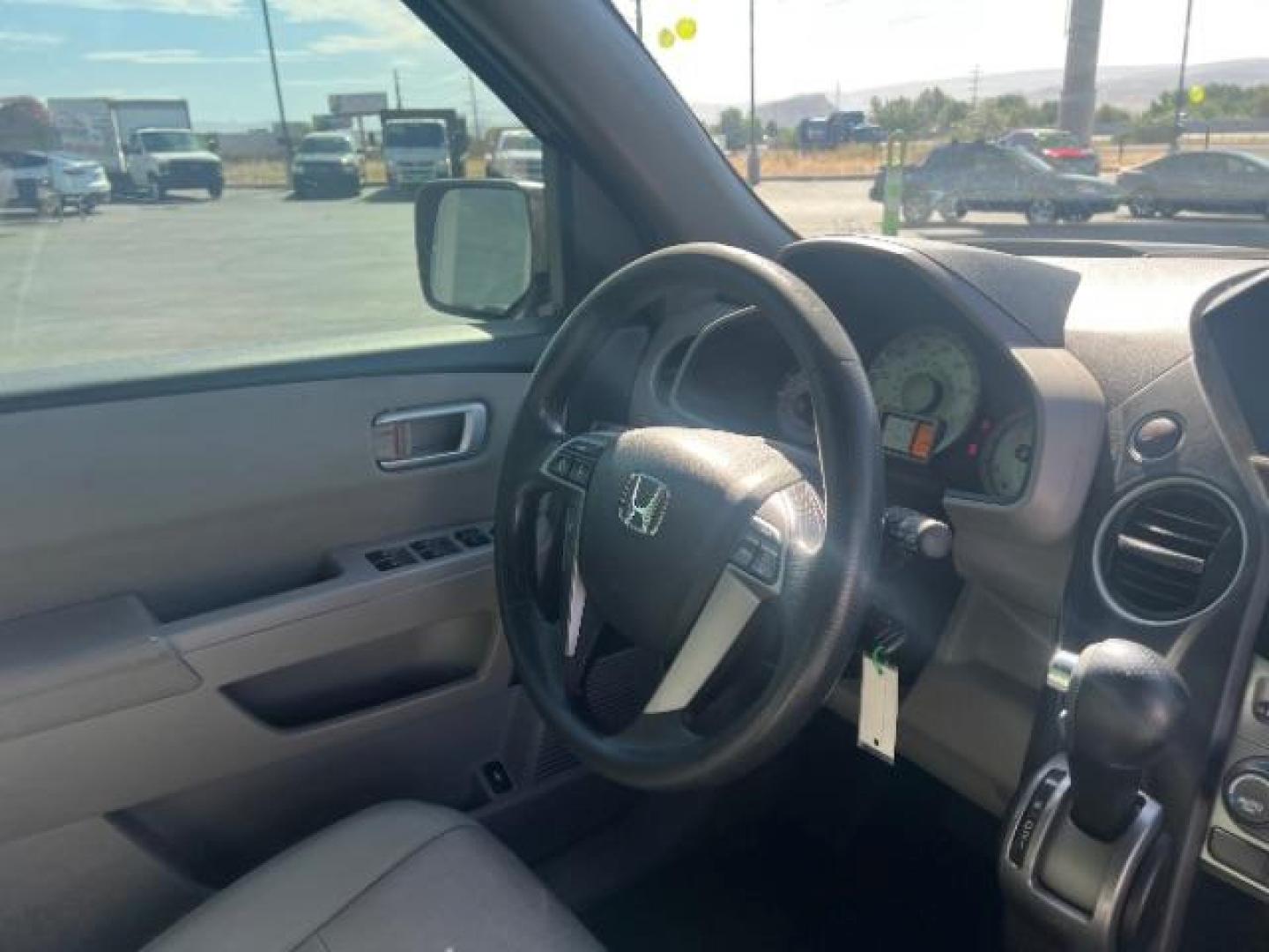 2013 Polished Metal Metallic /Gray Honda Pilot EX (5FNYF3H47DB) with an 3.5L V-6 i-VTEC VCM variable valve control engine, Automatic transmission, located at 1865 East Red Hills Pkwy, St. George, 84770, (435) 628-0023, 37.120850, -113.543640 - Photo#34