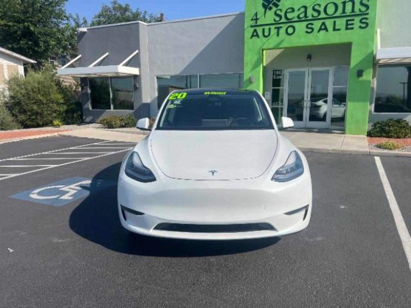 2020 Pearl White Multi-Coat /Black Tesla Model Y Long Range Dual Motor All-Wheel Drive (5YJYGDEE6LF) with an ELECTRIC engine, Continuously Variable Transmission transmission, located at 1865 East Red Hills Pkwy, St. George, 84770, (435) 628-0023, 37.120850, -113.543640 - This Tesla is an AWD Long range. Battery is 90% healthy, 289 on full charge. Near new condition! Full Tesla factory warranty up to 120k miles. Extended EV battery warranty available. Financing for ALL credit types. 4 Seasons Auto THE southern Utah Tesla Experts. Call or text for more info DL# 7 - Photo#3