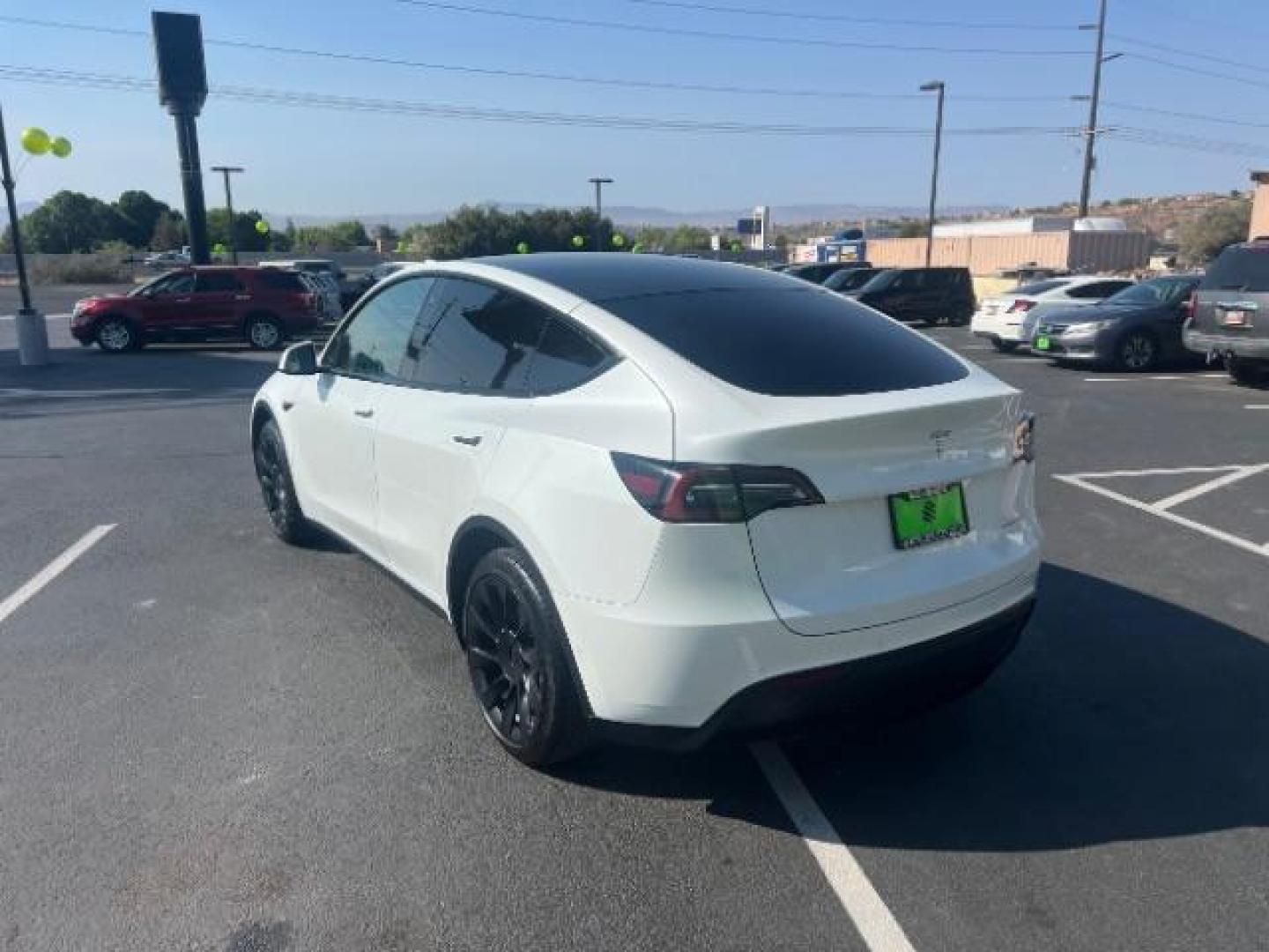 2020 Pearl White Multi-Coat /Black Tesla Model Y Long Range Dual Motor All-Wheel Drive (5YJYGDEE6LF) with an ELECTRIC engine, Continuously Variable Transmission transmission, located at 1865 East Red Hills Pkwy, St. George, 84770, (435) 628-0023, 37.120850, -113.543640 - This Tesla is an AWD Long range. Battery is 90% healthy, 289 on full charge. Near new condition! Full Tesla factory warranty up to 120k miles. Extended EV battery warranty available. Financing for ALL credit types. 4 Seasons Auto THE southern Utah Tesla Experts. Call or text for more info DL# 7 - Photo#6