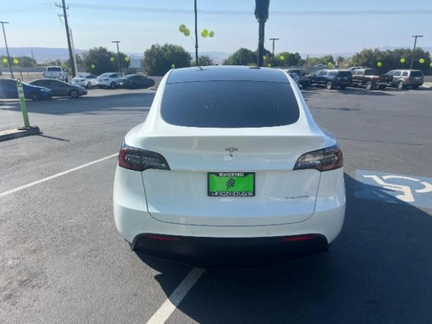2020 Pearl White Multi-Coat /Black Tesla Model Y Long Range Dual Motor All-Wheel Drive (5YJYGDEE6LF) with an ELECTRIC engine, Continuously Variable Transmission transmission, located at 1865 East Red Hills Pkwy, St. George, 84770, (435) 628-0023, 37.120850, -113.543640 - This Tesla is an AWD Long range. Battery is 90% healthy, 289 on full charge. Near new condition! Full Tesla factory warranty up to 120k miles. Extended EV battery warranty available. Financing for ALL credit types. 4 Seasons Auto THE southern Utah Tesla Experts. Call or text for more info DL# 7 - Photo#7