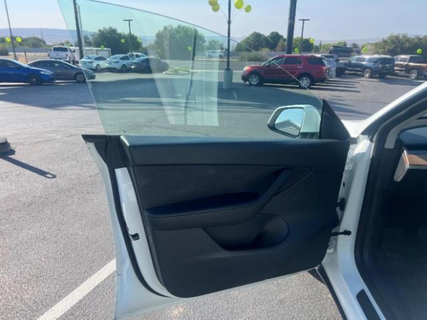 2020 Pearl White Multi-Coat /Black Tesla Model Y Long Range Dual Motor All-Wheel Drive (5YJYGDEE6LF) with an ELECTRIC engine, Continuously Variable Transmission transmission, located at 1865 East Red Hills Pkwy, St. George, 84770, (435) 628-0023, 37.120850, -113.543640 - This Tesla is an AWD Long range. Battery is 90% healthy, 289 on full charge. Near new condition! Full Tesla factory warranty up to 120k miles. Extended EV battery warranty available. Financing for ALL credit types. 4 Seasons Auto THE southern Utah Tesla Experts. Call or text for more info DL# 7 - Photo#14