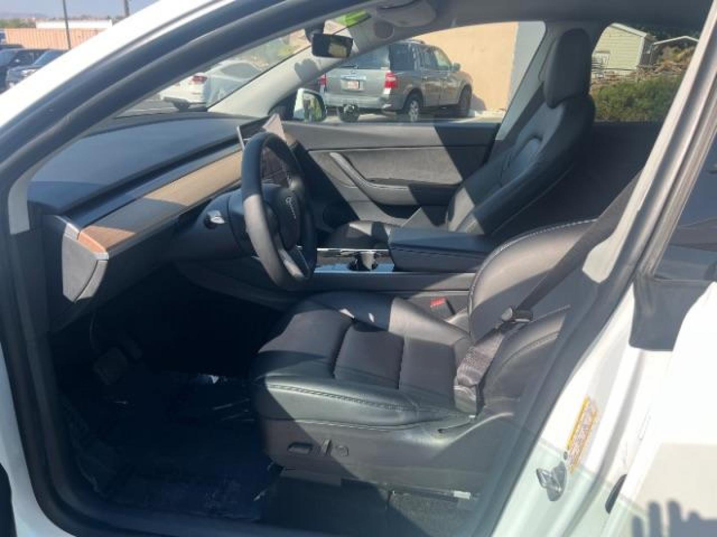 2020 Pearl White Multi-Coat /Black Tesla Model Y Long Range Dual Motor All-Wheel Drive (5YJYGDEE6LF) with an ELECTRIC engine, Continuously Variable Transmission transmission, located at 1865 East Red Hills Pkwy, St. George, 84770, (435) 628-0023, 37.120850, -113.543640 - This Tesla is an AWD Long range. Battery is 90% healthy, 289 on full charge. Near new condition! Full Tesla factory warranty up to 120k miles. Extended EV battery warranty available. Financing for ALL credit types. 4 Seasons Auto THE southern Utah Tesla Experts. Call or text for more info DL# 7 - Photo#16