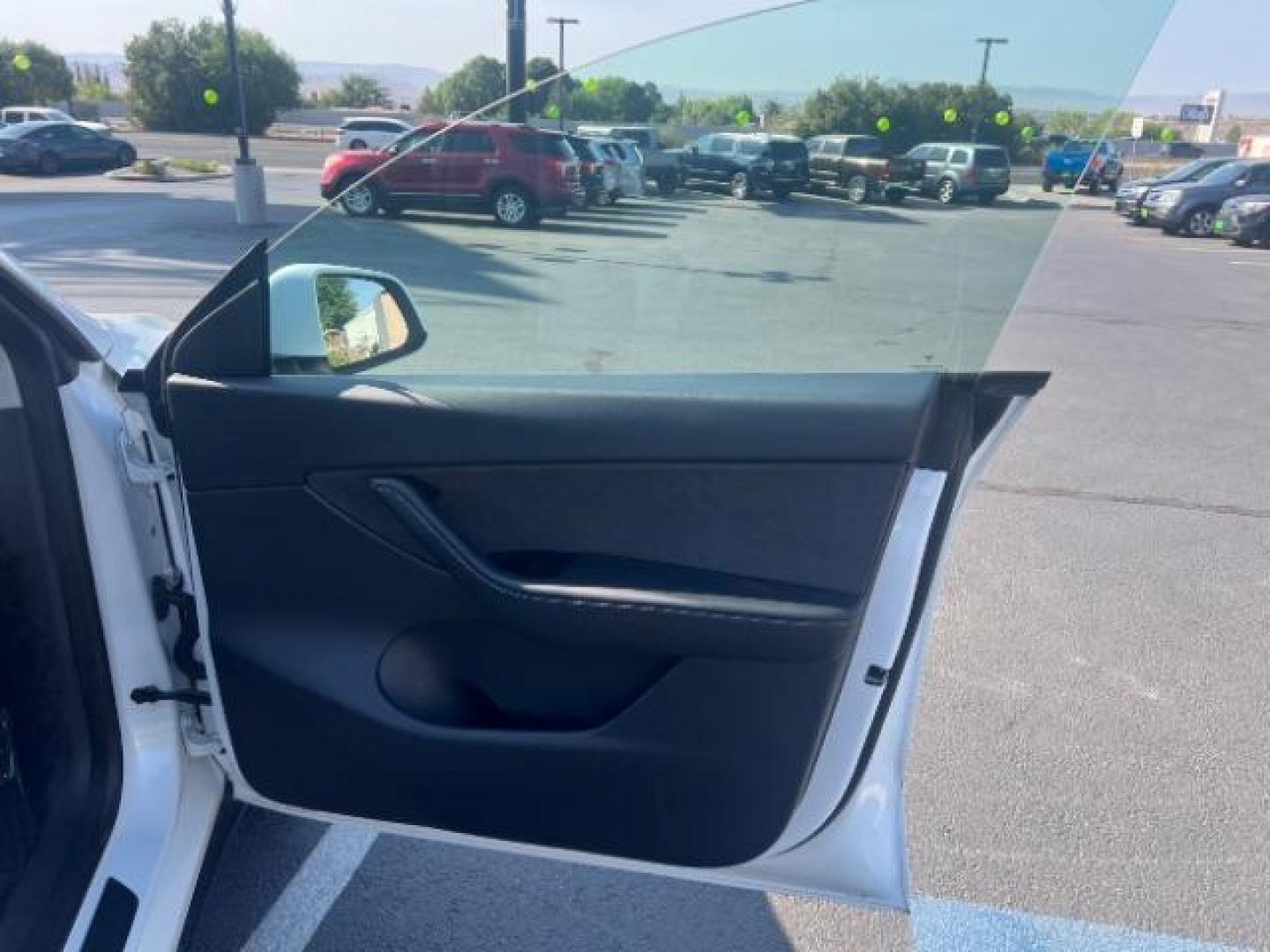2020 Pearl White Multi-Coat /Black Tesla Model Y Long Range Dual Motor All-Wheel Drive (5YJYGDEE6LF) with an ELECTRIC engine, Continuously Variable Transmission transmission, located at 1865 East Red Hills Pkwy, St. George, 84770, (435) 628-0023, 37.120850, -113.543640 - This Tesla is an AWD Long range. Battery is 90% healthy, 289 on full charge. Near new condition! Full Tesla factory warranty up to 120k miles. Extended EV battery warranty available. Financing for ALL credit types. 4 Seasons Auto THE southern Utah Tesla Experts. Call or text for more info DL# 7 - Photo#27