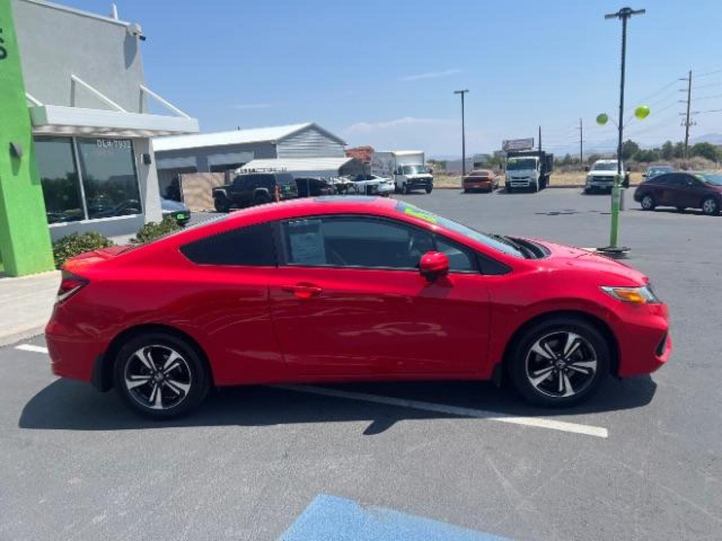 2015 Rallye Red /Gray Honda Civic EX (2HGFG3B82FH) with an 1.8L I-4 i-VTEC variable valve control engine, Automatic transmission, located at 1865 East Red Hills Pkwy, St. George, 84770, (435) 628-0023, 37.120850, -113.543640 - We specialize in helping ALL people get the best financing available. No matter your credit score, good, bad or none we can get you an amazing rate. Had a bankruptcy, divorce, or repossessions? We give you the green light to get your credit back on the road. Low down and affordable payments that fit - Photo#7