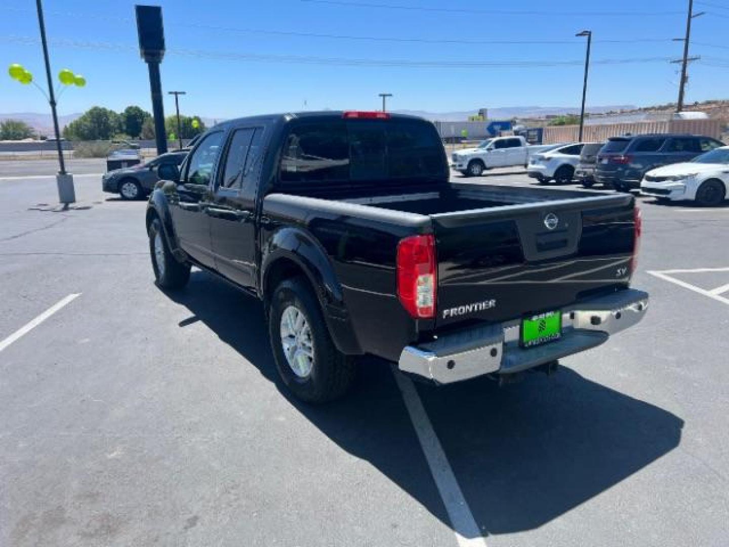 2015 Super Black /Steel Nissan Frontier SV (1N6AD0ER8FN) with an VQ 4L V-6 DOHC engine, Automatic transmission, located at 1865 East Red Hills Pkwy, St. George, 84770, (435) 628-0023, 37.120850, -113.543640 - Photo#4
