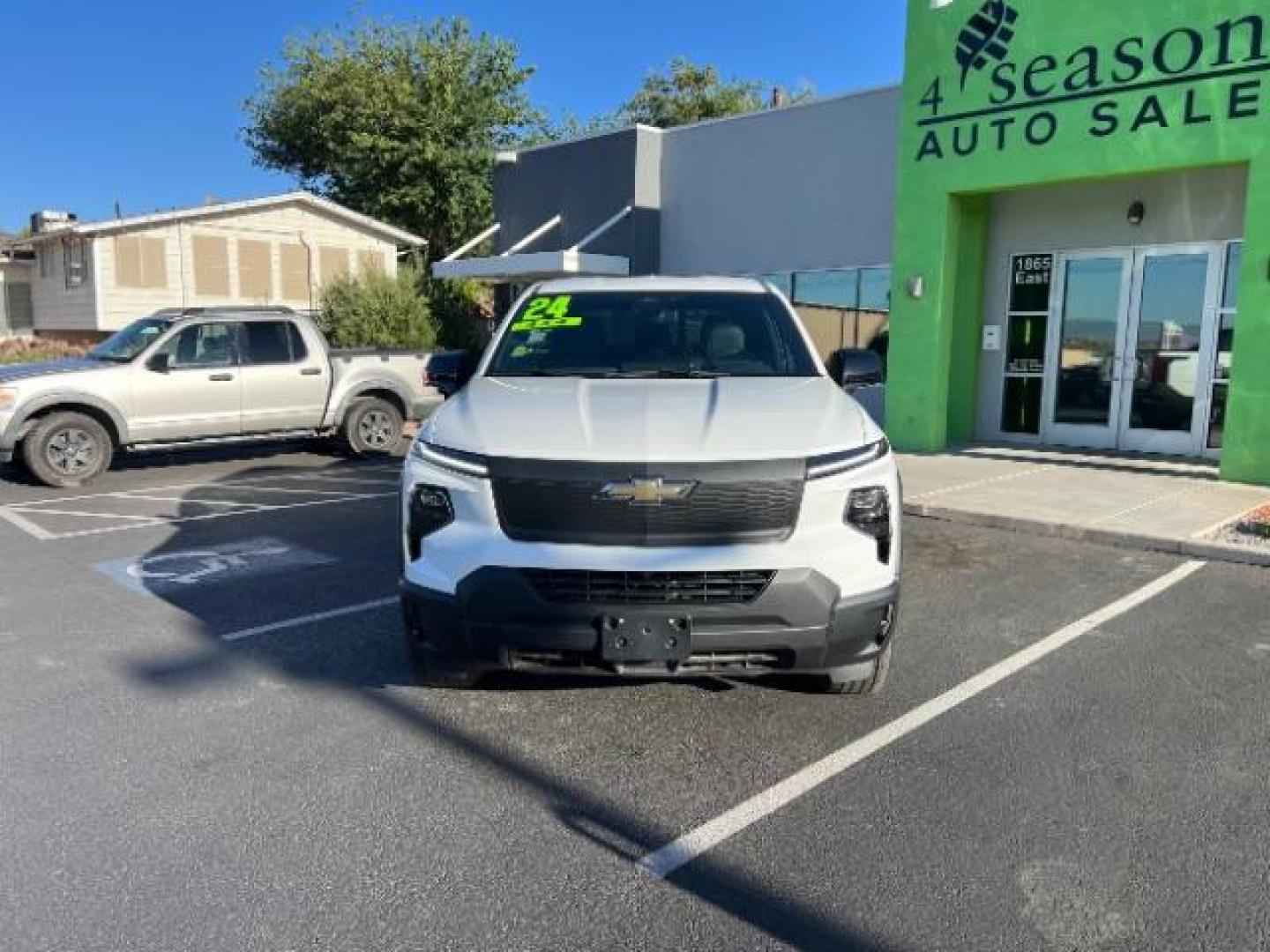 2024 Summit White /Jet Black Chevrolet Silverado EV Work Truck (1GC10UED4RU) with an ELECTRIC engine, Continuously Variable Transmission transmission, located at 1865 East Red Hills Pkwy, St. George, 84770, (435) 628-0023, 37.120850, -113.543640 - Brand new Silverado EV at huge discount. Gets 450 miles on full charge. Capable to super charge on Tesla network with included adapter. The 2024 Chevrolet Silverado EV WT (Work Truck) is a full-size electric pickup designed for work and fleet use. It features a dual-motor, all-wheel-drive system, - Photo#1