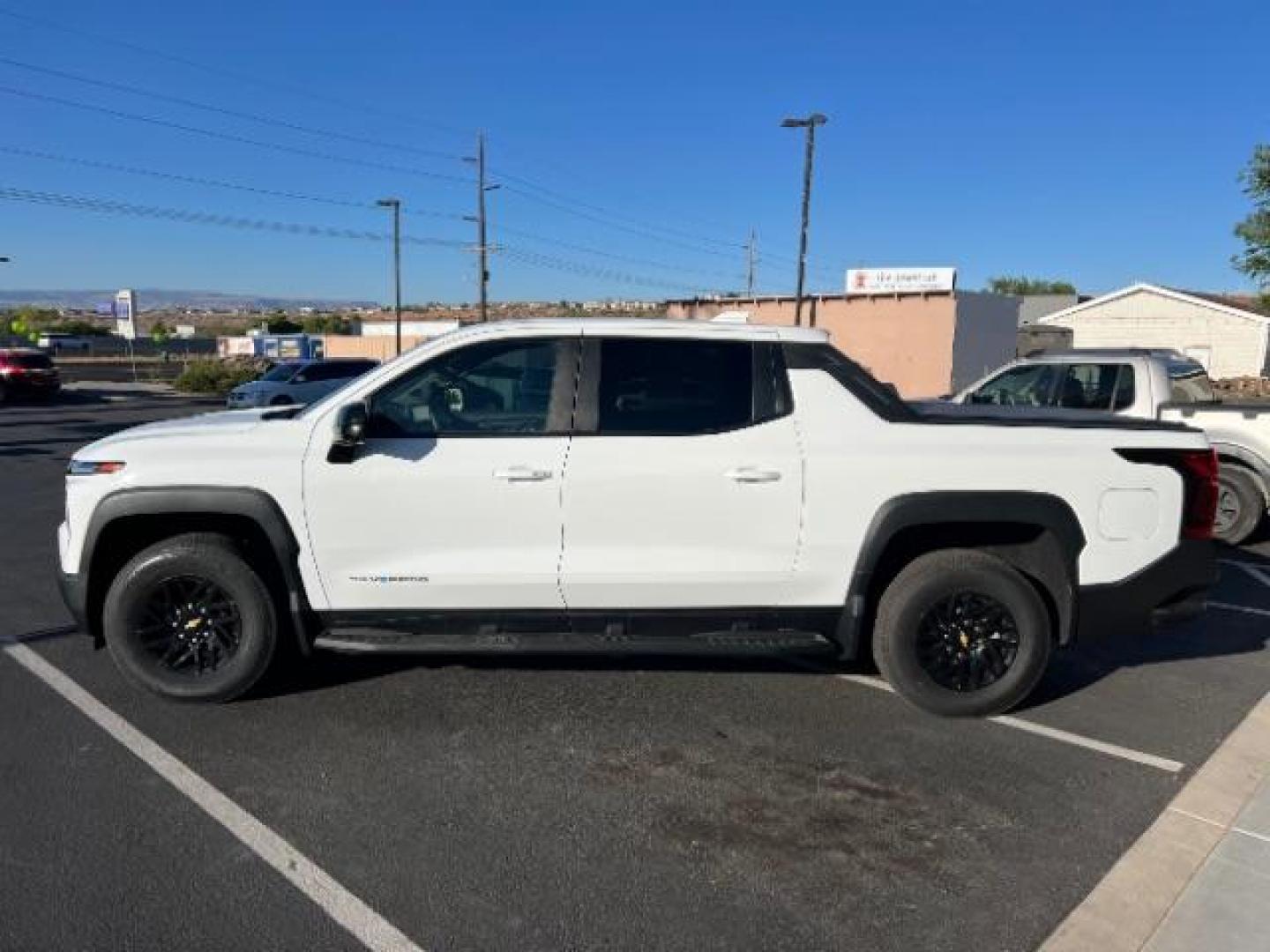 2024 Summit White /Jet Black Chevrolet Silverado EV Work Truck (1GC10UED4RU) with an ELECTRIC engine, Continuously Variable Transmission transmission, located at 1865 East Red Hills Pkwy, St. George, 84770, (435) 628-0023, 37.120850, -113.543640 - Brand new Silverado EV at huge discount. Gets 450 miles on full charge. Capable to super charge on Tesla network with included adapter. The 2024 Chevrolet Silverado EV WT (Work Truck) is a full-size electric pickup designed for work and fleet use. It features a dual-motor, all-wheel-drive system, - Photo#3