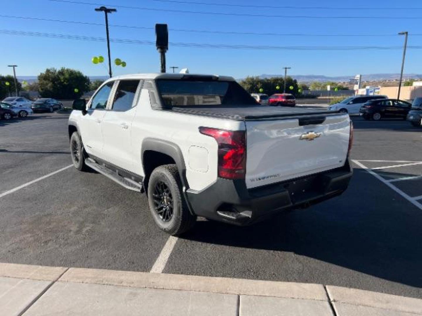 2024 Summit White /Jet Black Chevrolet Silverado EV Work Truck (1GC10UED4RU) with an ELECTRIC engine, Continuously Variable Transmission transmission, located at 1865 East Red Hills Pkwy, St. George, 84770, (435) 628-0023, 37.120850, -113.543640 - Brand new Silverado EV at huge discount. Gets 450 miles on full charge. Capable to super charge on Tesla network with included adapter. The 2024 Chevrolet Silverado EV WT (Work Truck) is a full-size electric pickup designed for work and fleet use. It features a dual-motor, all-wheel-drive system, - Photo#4