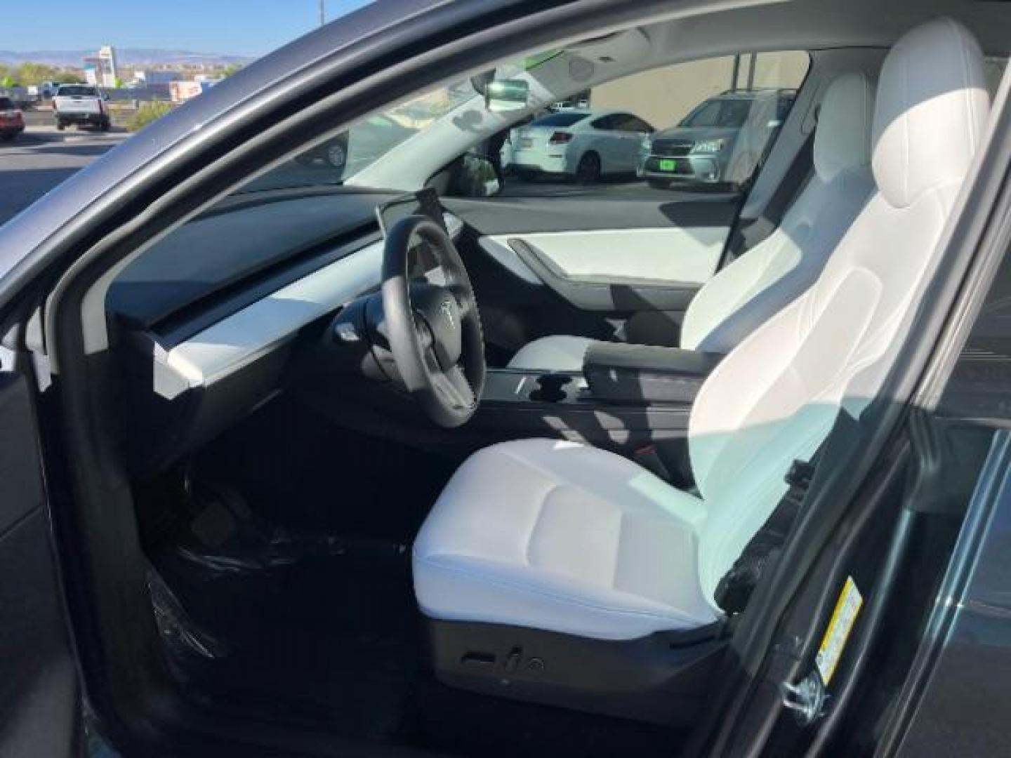 2021 Midnight Silver Metallic /White/Black Tesla Model Y Long Range Dual Motor All-Wheel Drive (5YJYGDEE8MF) with an ELECTRIC engine, Continuously Variable Transmission transmission, located at 1865 East Red Hills Pkwy, St. George, 84770, (435) 628-0023, 37.120850, -113.543640 - ****Price includes $4k IRS EV REBATE**** We are approved to file the EV rebate directly with the IRS. We recived the funds in 7 days and take credit off the price of car. Check with IRS EV website to be sure you qualify. This program ends Sept 30th so ACT FAST! This Tesla is an AWD Long Range. Bat - Photo#16