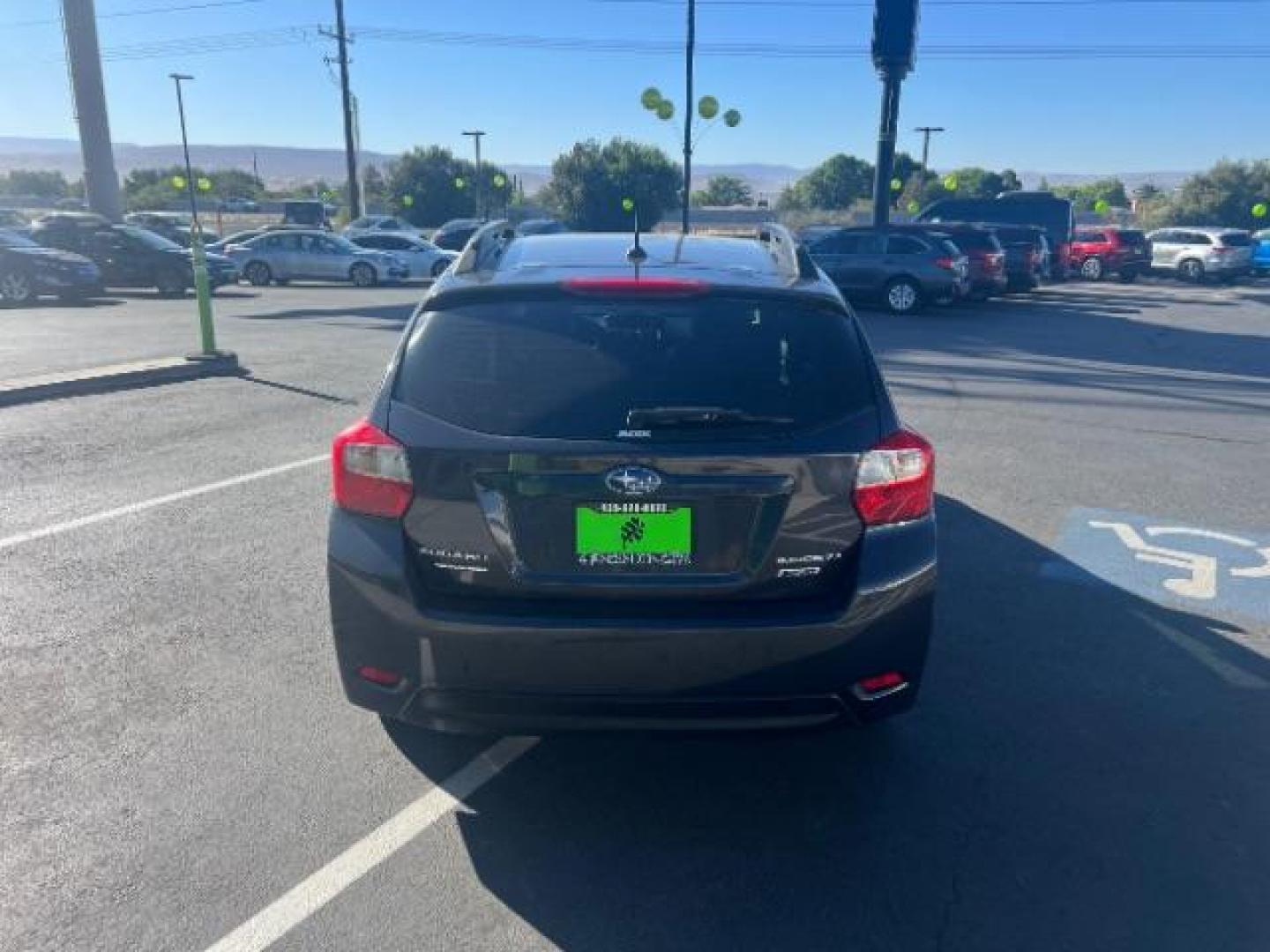 2015 Dark Gray Metallic /Black Subaru Impreza 2.0i Sport Limited (JF1GPAV65F8) with an 2L H-4 DOHC engine, Automatic transmission, located at 940 North Main Street, Cedar City, UT, 84720, (435) 628-0023, 37.692936, -113.061897 - We specialize in helping ALL people get the best financing available. No matter your credit score, good, bad or none we can get you an amazing rate. Had a bankruptcy, divorce, or repossessions? We give you the green light to get your credit back on the road. Low down and affordable payments that fit - Photo#5