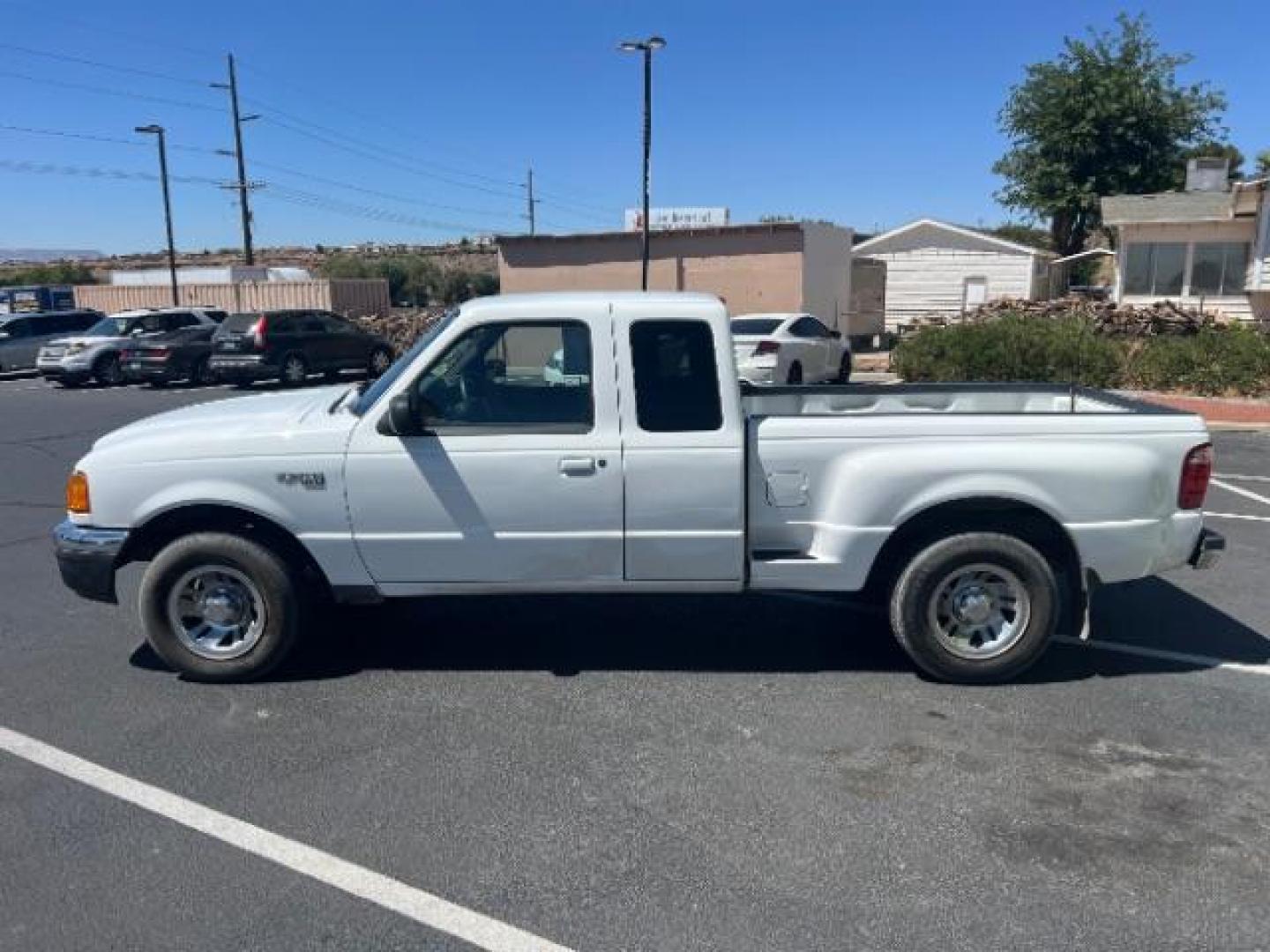 2004 Oxford White /Medium Dark Flint Cloth Interior Ford Ranger XLT SuperCab 3.0L AT 2WD (1FTYR44U94P) with an 3.0L V6 OHV 12V engine, 5-Speed Automatic transmission, located at 940 North Main Street, Cedar City, UT, 84720, (435) 628-0023, 37.692936, -113.061897 - Photo#3