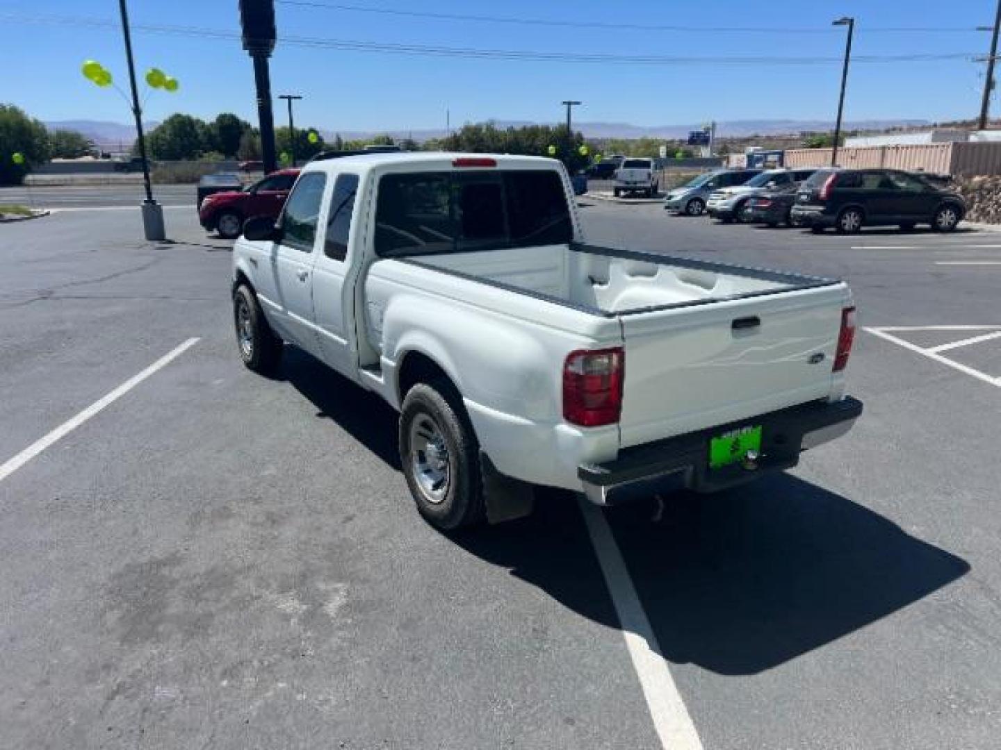 2004 Oxford White /Medium Dark Flint Cloth Interior Ford Ranger XLT SuperCab 3.0L AT 2WD (1FTYR44U94P) with an 3.0L V6 OHV 12V engine, 5-Speed Automatic transmission, located at 940 North Main Street, Cedar City, UT, 84720, (435) 628-0023, 37.692936, -113.061897 - Photo#4