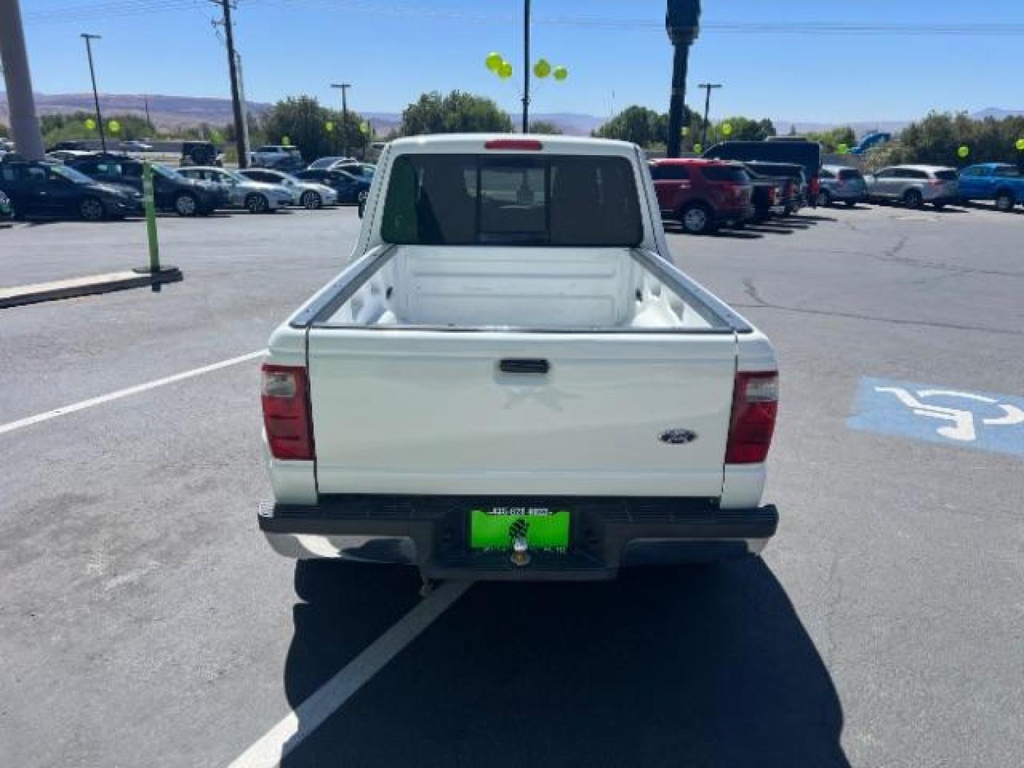 2004 Oxford White /Medium Dark Flint Cloth Interior Ford Ranger XLT SuperCab 3.0L AT 2WD (1FTYR44U94P) with an 3.0L V6 OHV 12V engine, 5-Speed Automatic transmission, located at 940 North Main Street, Cedar City, UT, 84720, (435) 628-0023, 37.692936, -113.061897 - Photo#5