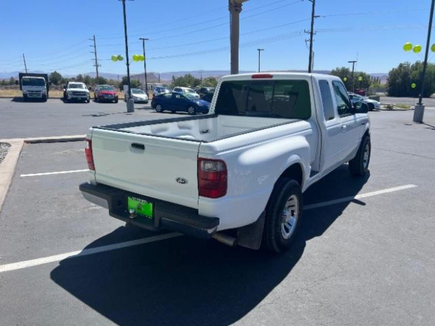2004 Oxford White /Medium Dark Flint Cloth Interior Ford Ranger XLT SuperCab 3.0L AT 2WD (1FTYR44U94P) with an 3.0L V6 OHV 12V engine, 5-Speed Automatic transmission, located at 940 North Main Street, Cedar City, UT, 84720, (435) 628-0023, 37.692936, -113.061897 - Photo#6