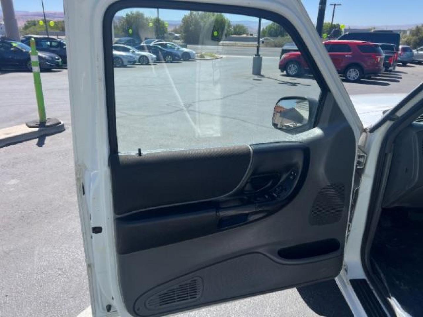 2004 Oxford White /Medium Dark Flint Cloth Interior Ford Ranger XLT SuperCab 3.0L AT 2WD (1FTYR44U94P) with an 3.0L V6 OHV 12V engine, 5-Speed Automatic transmission, located at 940 North Main Street, Cedar City, UT, 84720, (435) 628-0023, 37.692936, -113.061897 - Photo#12
