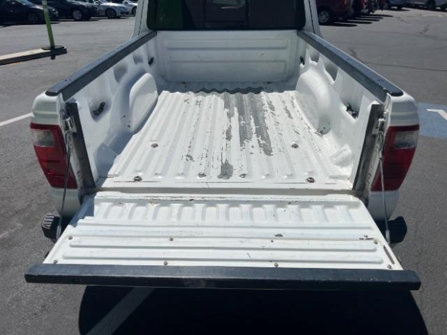 2004 Oxford White /Medium Dark Flint Cloth Interior Ford Ranger XLT SuperCab 3.0L AT 2WD (1FTYR44U94P) with an 3.0L V6 OHV 12V engine, 5-Speed Automatic transmission, located at 940 North Main Street, Cedar City, UT, 84720, (435) 628-0023, 37.692936, -113.061897 - Photo#21
