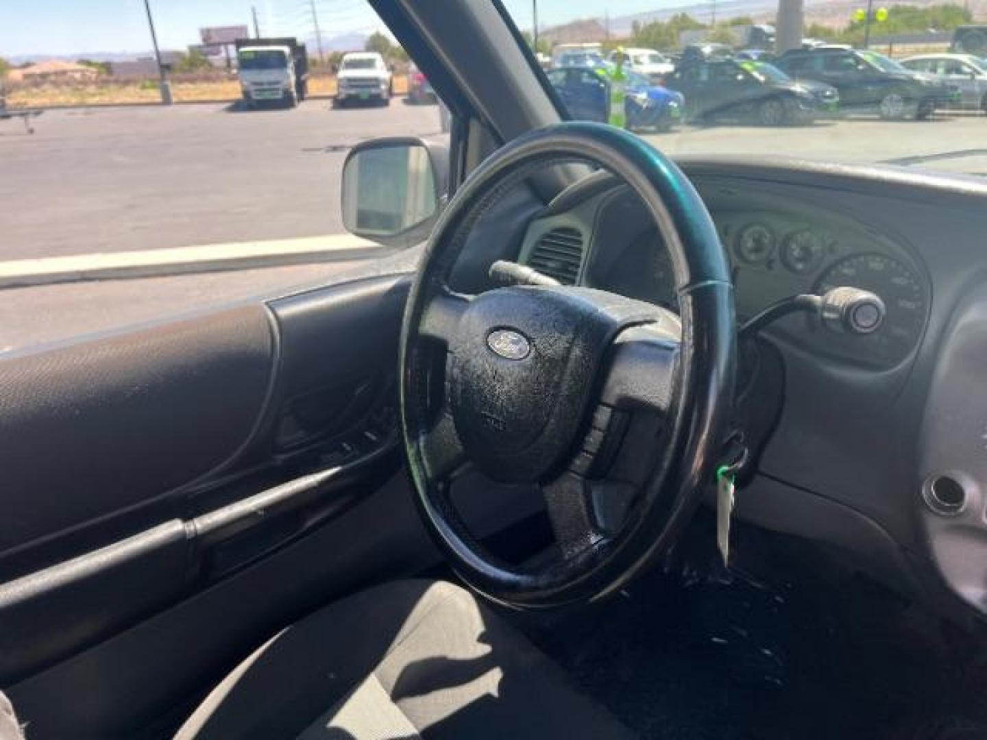 2004 Oxford White /Medium Dark Flint Cloth Interior Ford Ranger XLT SuperCab 3.0L AT 2WD (1FTYR44U94P) with an 3.0L V6 OHV 12V engine, 5-Speed Automatic transmission, located at 940 North Main Street, Cedar City, UT, 84720, (435) 628-0023, 37.692936, -113.061897 - Photo#27