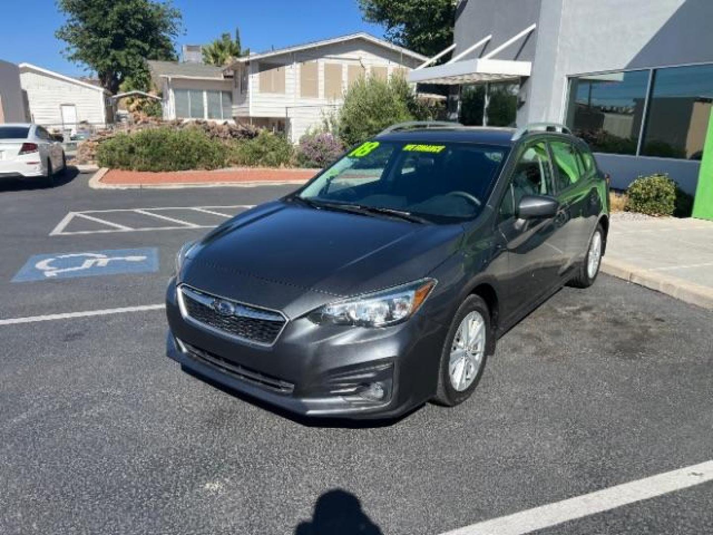 2018 Magnetite Gray Metallic /Black Subaru Impreza 2.0i Premium (4S3GTAB61J3) with an 2L H-4 gasoline direct injection engine, Automatic transmission, located at 940 North Main Street, Cedar City, UT, 84720, (435) 628-0023, 37.692936, -113.061897 - We specialize in helping ALL people get the best financing available. No matter your credit score, good, bad or none we can get you an amazing rate. Had a bankruptcy, divorce, or repossessions? We give you the green light to get your credit back on the road. Low down and affordable payments that fit - Photo#2