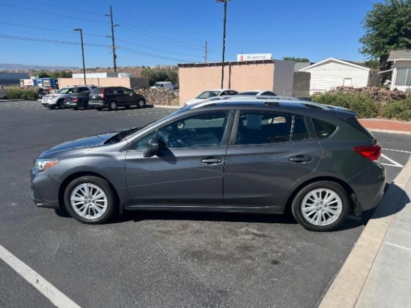 2018 Magnetite Gray Metallic /Black Subaru Impreza 2.0i Premium (4S3GTAB61J3) with an 2L H-4 gasoline direct injection engine, Automatic transmission, located at 940 North Main Street, Cedar City, UT, 84720, (435) 628-0023, 37.692936, -113.061897 - We specialize in helping ALL people get the best financing available. No matter your credit score, good, bad or none we can get you an amazing rate. Had a bankruptcy, divorce, or repossessions? We give you the green light to get your credit back on the road. Low down and affordable payments that fit - Photo#3