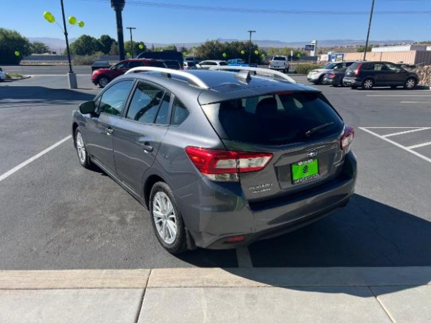 2018 Magnetite Gray Metallic /Black Subaru Impreza 2.0i Premium (4S3GTAB61J3) with an 2L H-4 gasoline direct injection engine, Automatic transmission, located at 940 North Main Street, Cedar City, UT, 84720, (435) 628-0023, 37.692936, -113.061897 - We specialize in helping ALL people get the best financing available. No matter your credit score, good, bad or none we can get you an amazing rate. Had a bankruptcy, divorce, or repossessions? We give you the green light to get your credit back on the road. Low down and affordable payments that fit - Photo#4