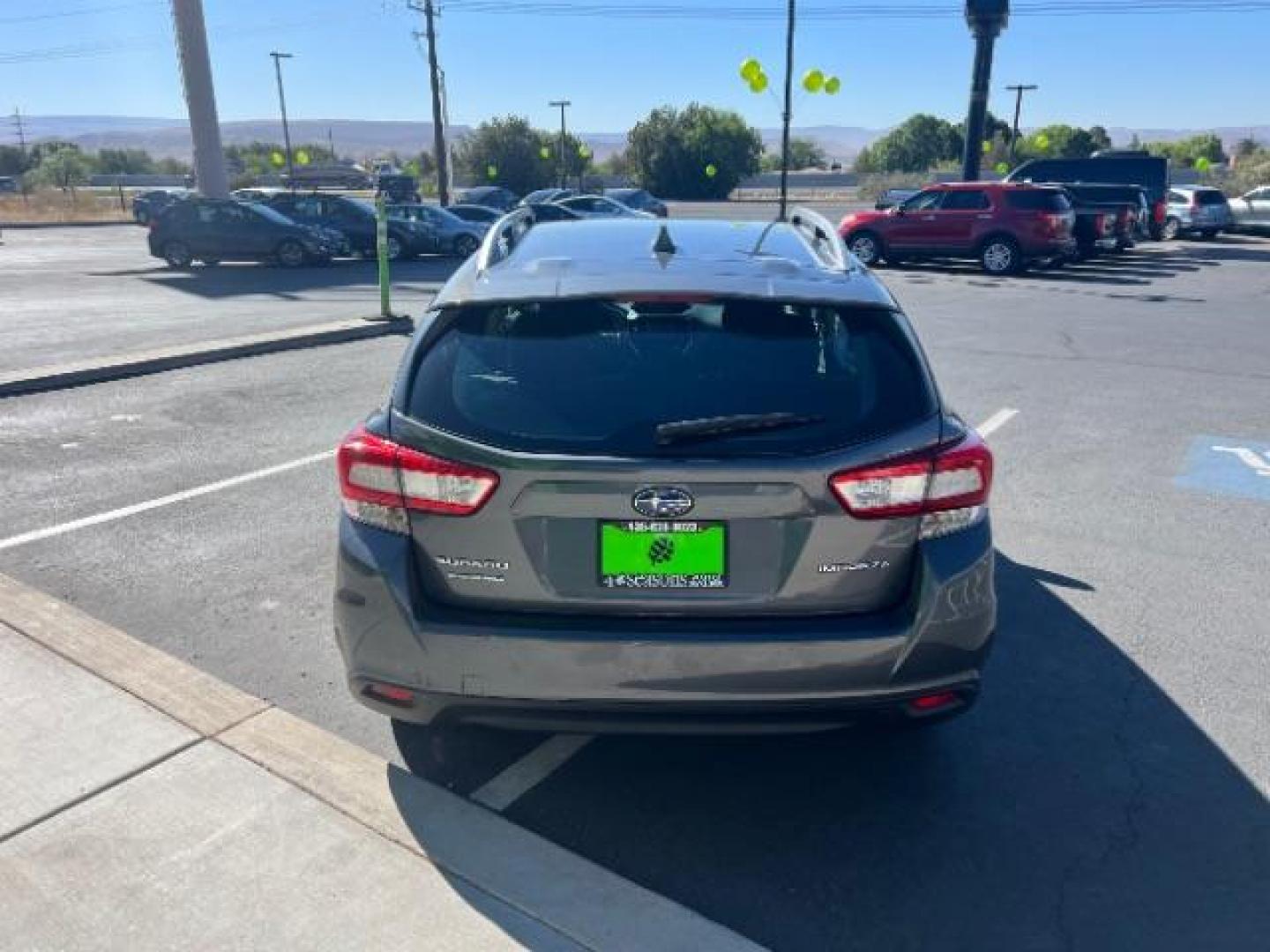 2018 Magnetite Gray Metallic /Black Subaru Impreza 2.0i Premium (4S3GTAB61J3) with an 2L H-4 gasoline direct injection engine, Automatic transmission, located at 940 North Main Street, Cedar City, UT, 84720, (435) 628-0023, 37.692936, -113.061897 - We specialize in helping ALL people get the best financing available. No matter your credit score, good, bad or none we can get you an amazing rate. Had a bankruptcy, divorce, or repossessions? We give you the green light to get your credit back on the road. Low down and affordable payments that fit - Photo#5