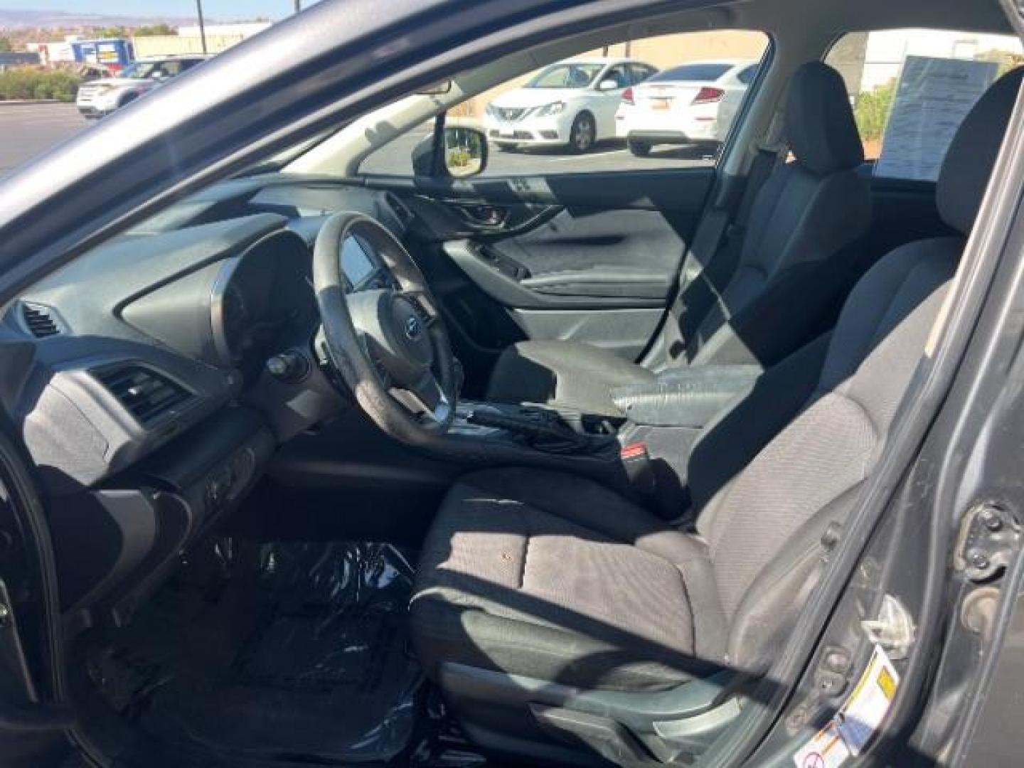 2018 Magnetite Gray Metallic /Black Subaru Impreza 2.0i Premium (4S3GTAB61J3) with an 2L H-4 gasoline direct injection engine, Automatic transmission, located at 940 North Main Street, Cedar City, UT, 84720, (435) 628-0023, 37.692936, -113.061897 - We specialize in helping ALL people get the best financing available. No matter your credit score, good, bad or none we can get you an amazing rate. Had a bankruptcy, divorce, or repossessions? We give you the green light to get your credit back on the road. Low down and affordable payments that fit - Photo#14